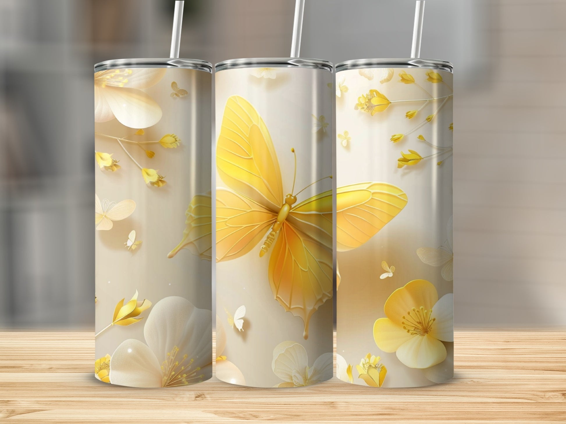 Three tumblers with yellow butterfly and flower designs.