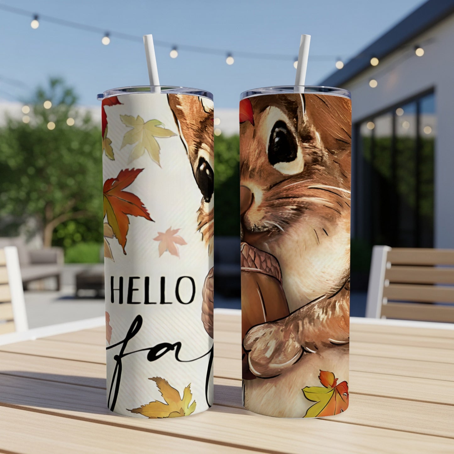 Two tumblers with squirrel and autumn leaf graphics, "Hello Fall" text.