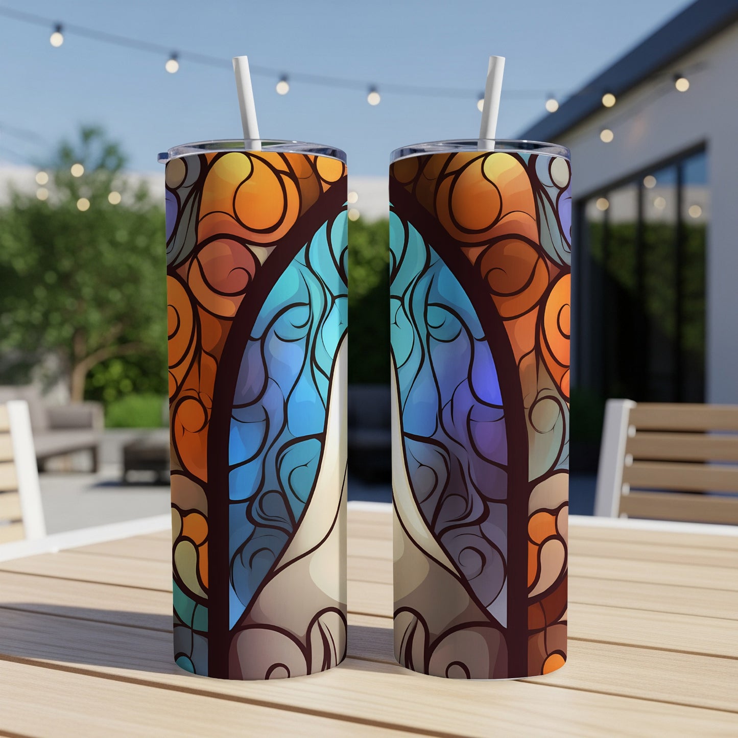 Two tumblers with a stained-glass-inspired celestial moon design.