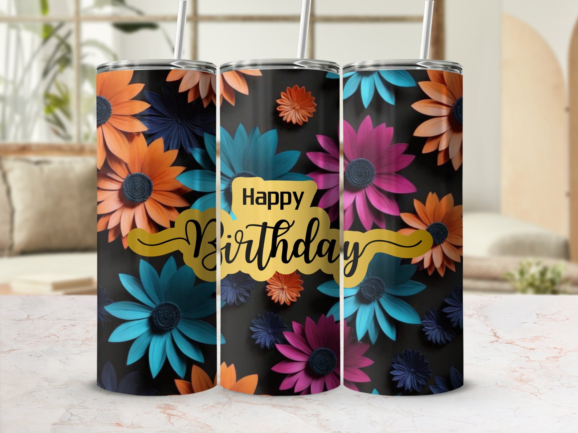 Three tumblers with colorful floral designs and "Happy Birthday" text.