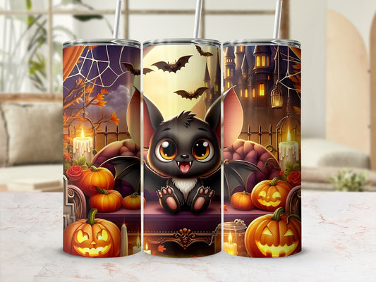 Halloween tumbler with cute bat, pumpkins, bats, and haunted castle design.