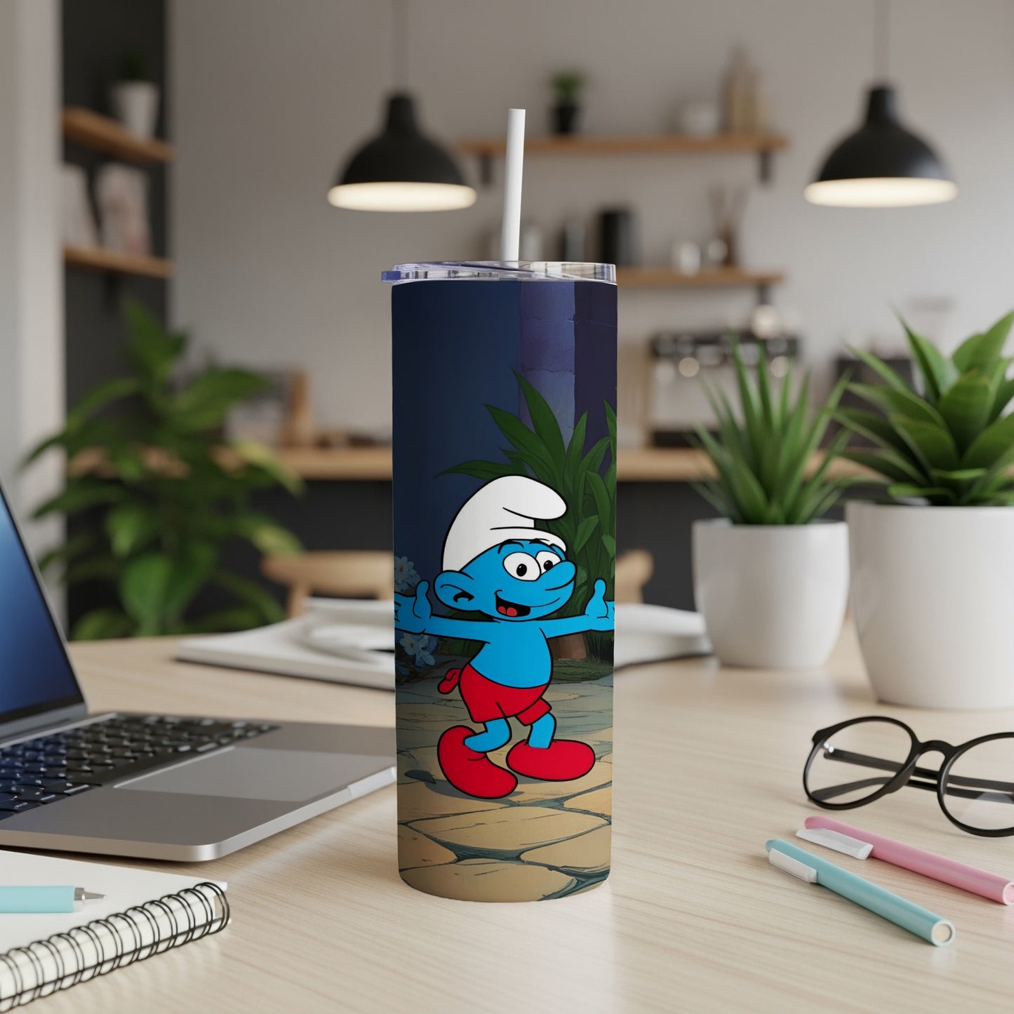 Smurf character with red shorts and blue shirt on a tumbler.