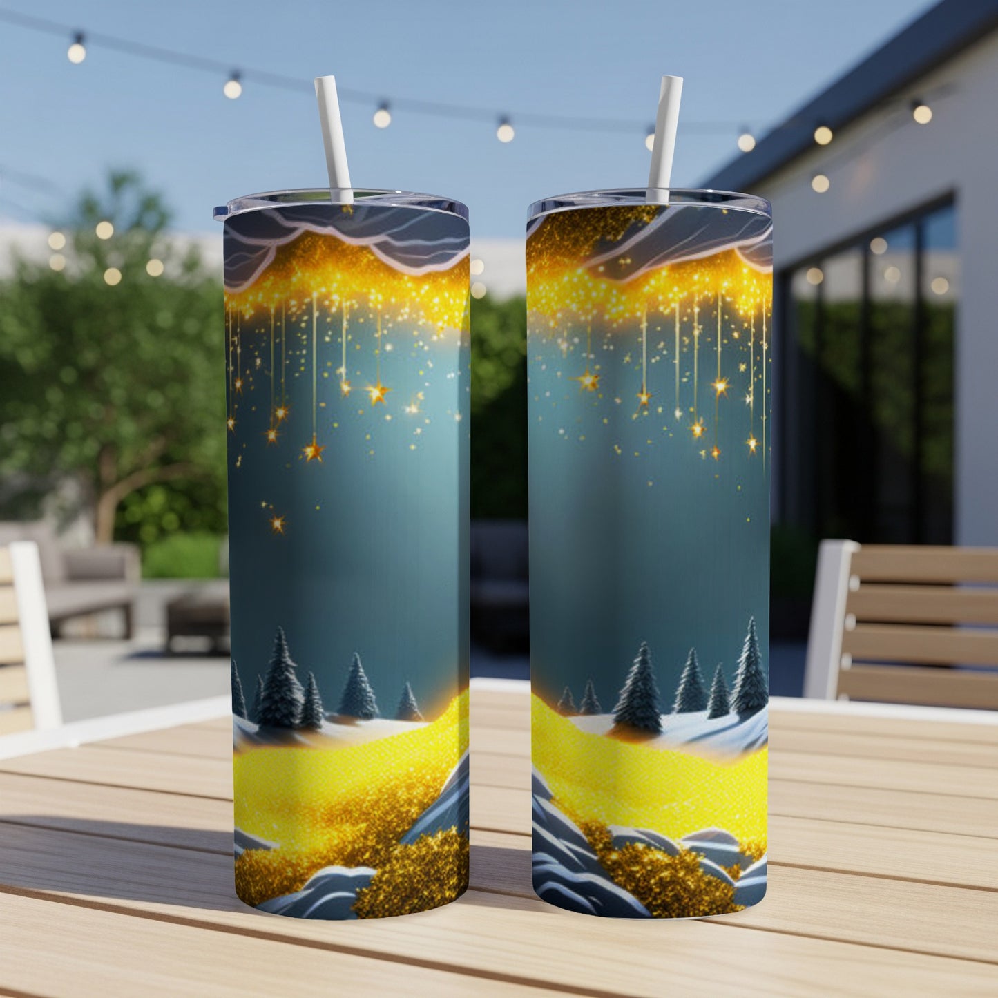 Two tumblers with a starry night winter scene and golden glitter.
