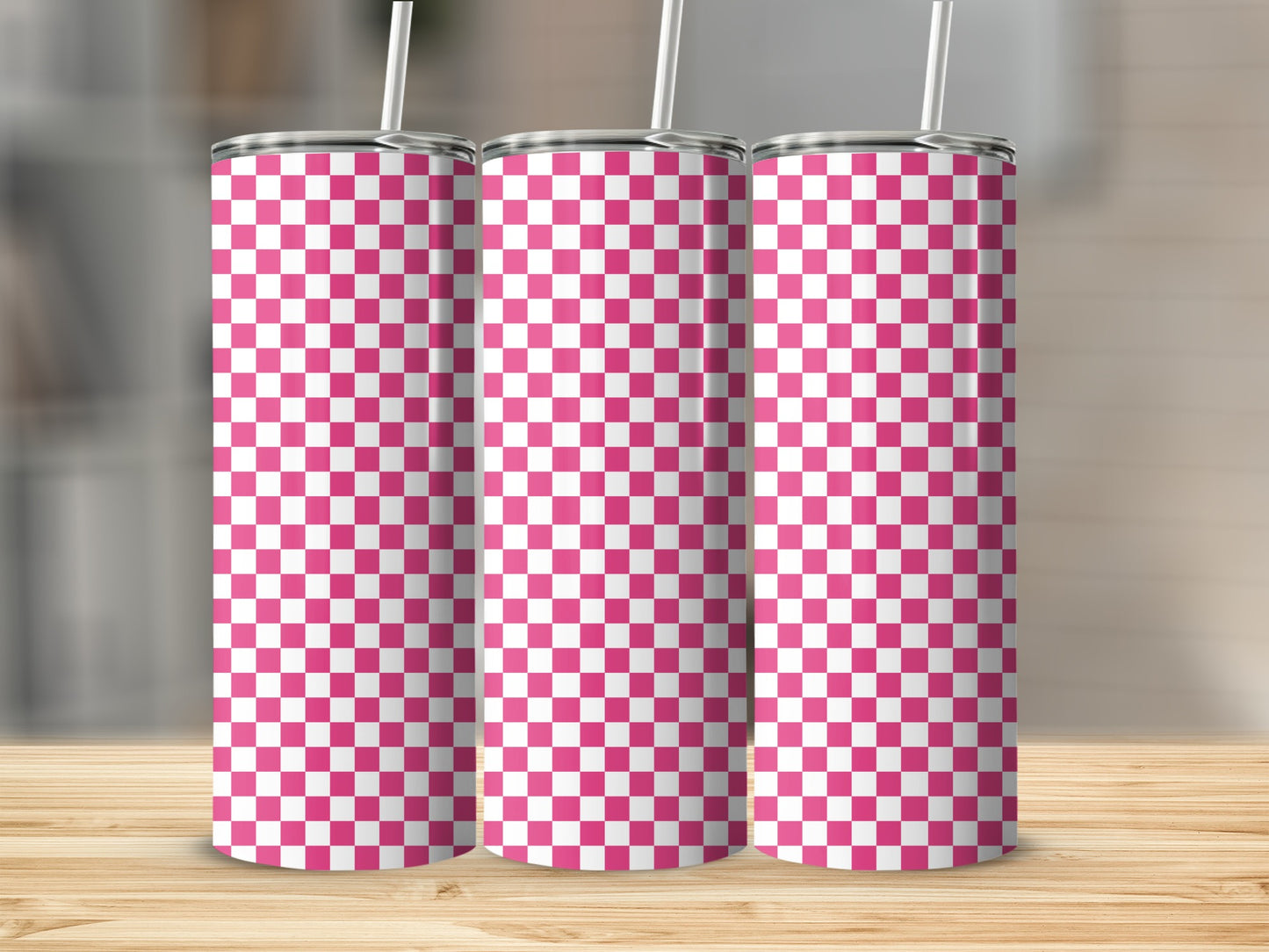 Three tall, cylindrical tumblers with a pink and white checkerboard pattern.