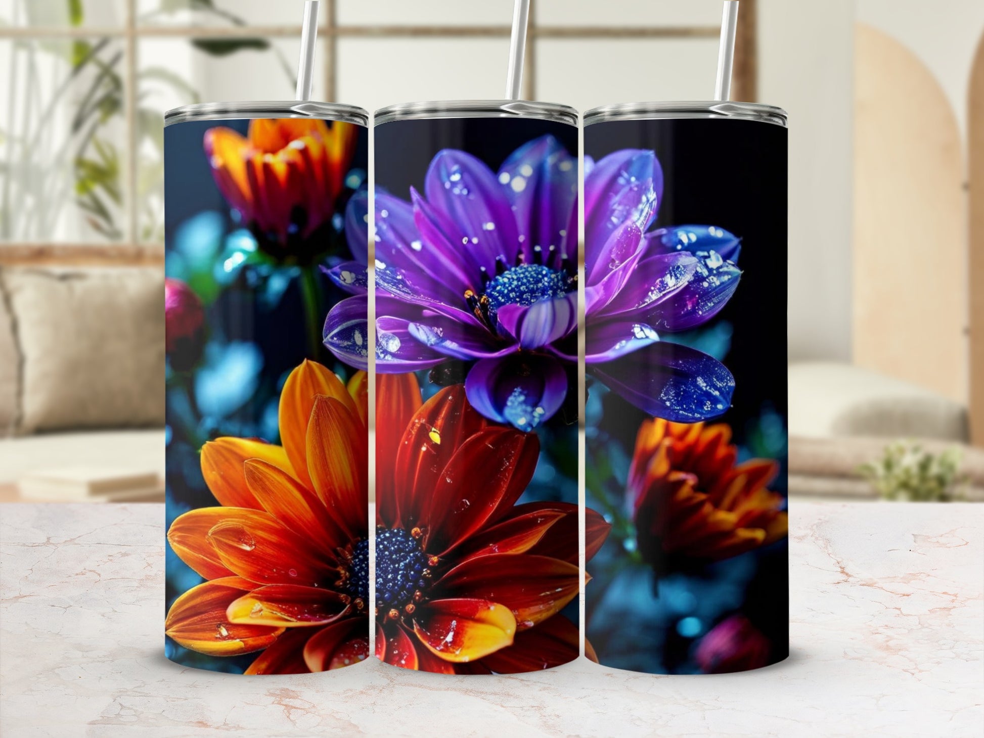 Three tumblers with vibrant purple and orange flowers and water droplets.