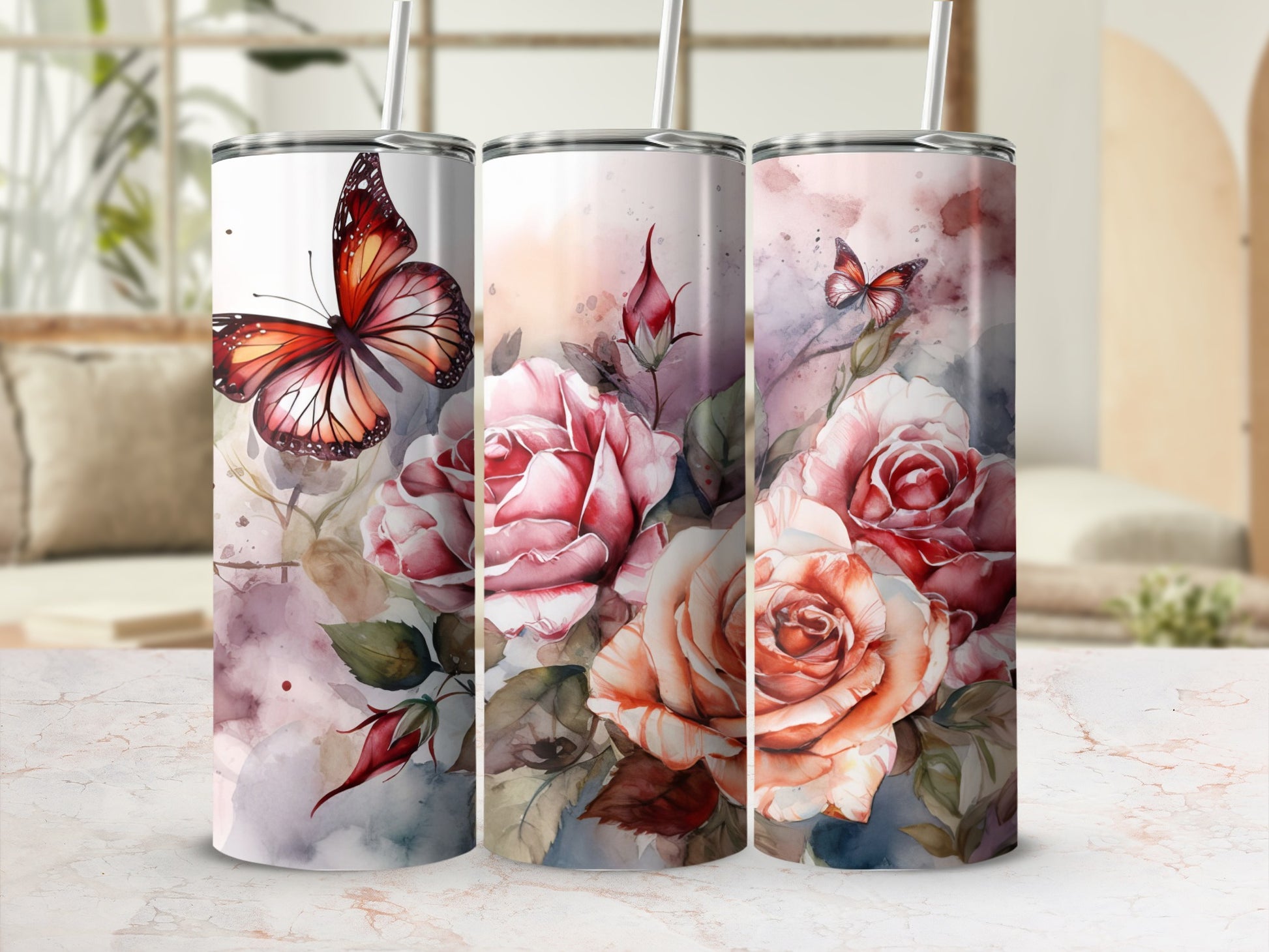 Three tumblers featuring a watercolor butterfly and pink roses design.