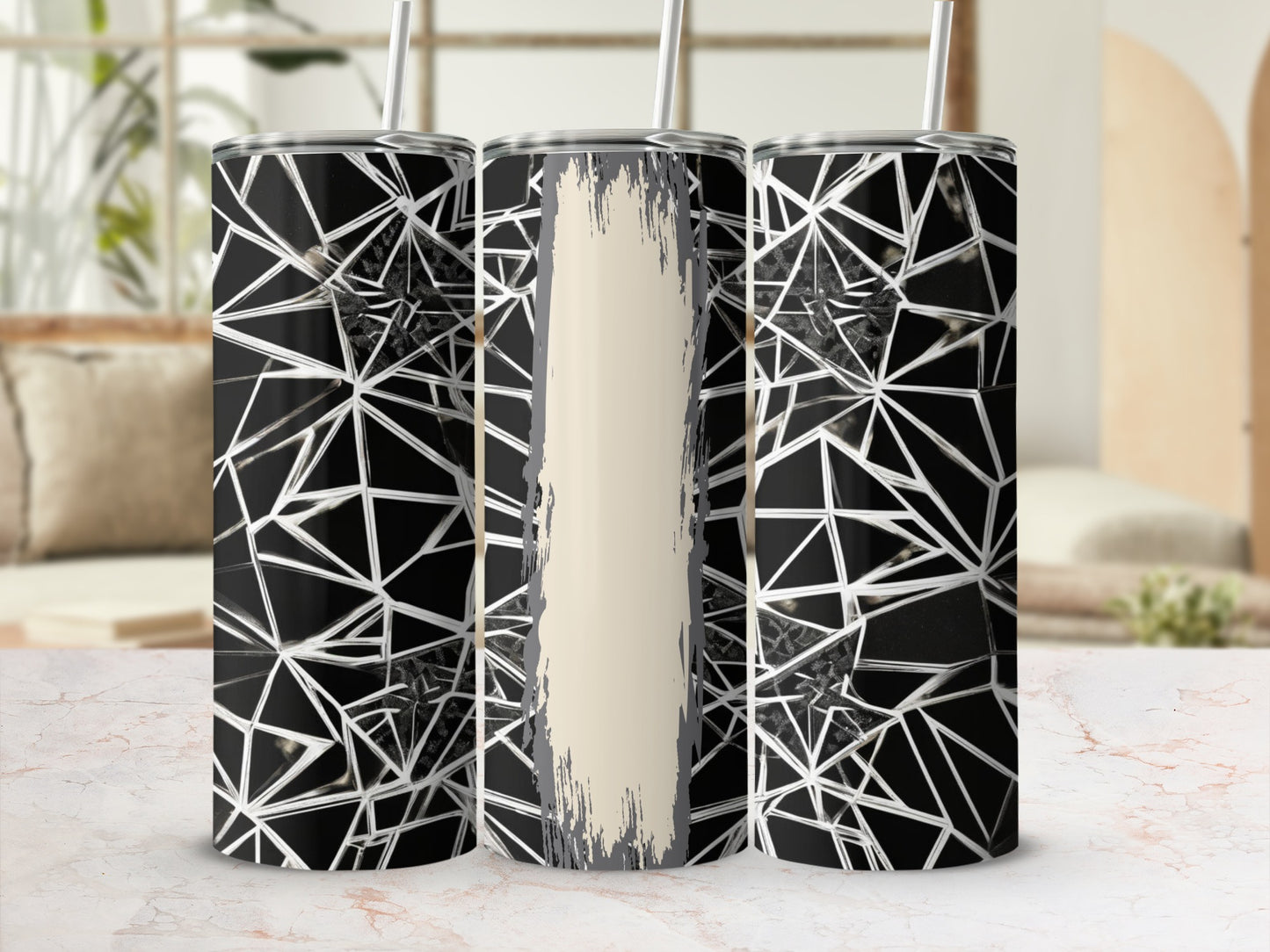 Three tumblers with a black geometric pattern and a beige brushstroke design.