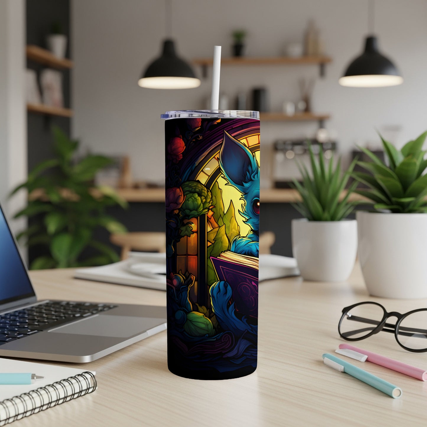 Tall tumbler with a blue fox-like creature reading a book in a stained-glass window scene.