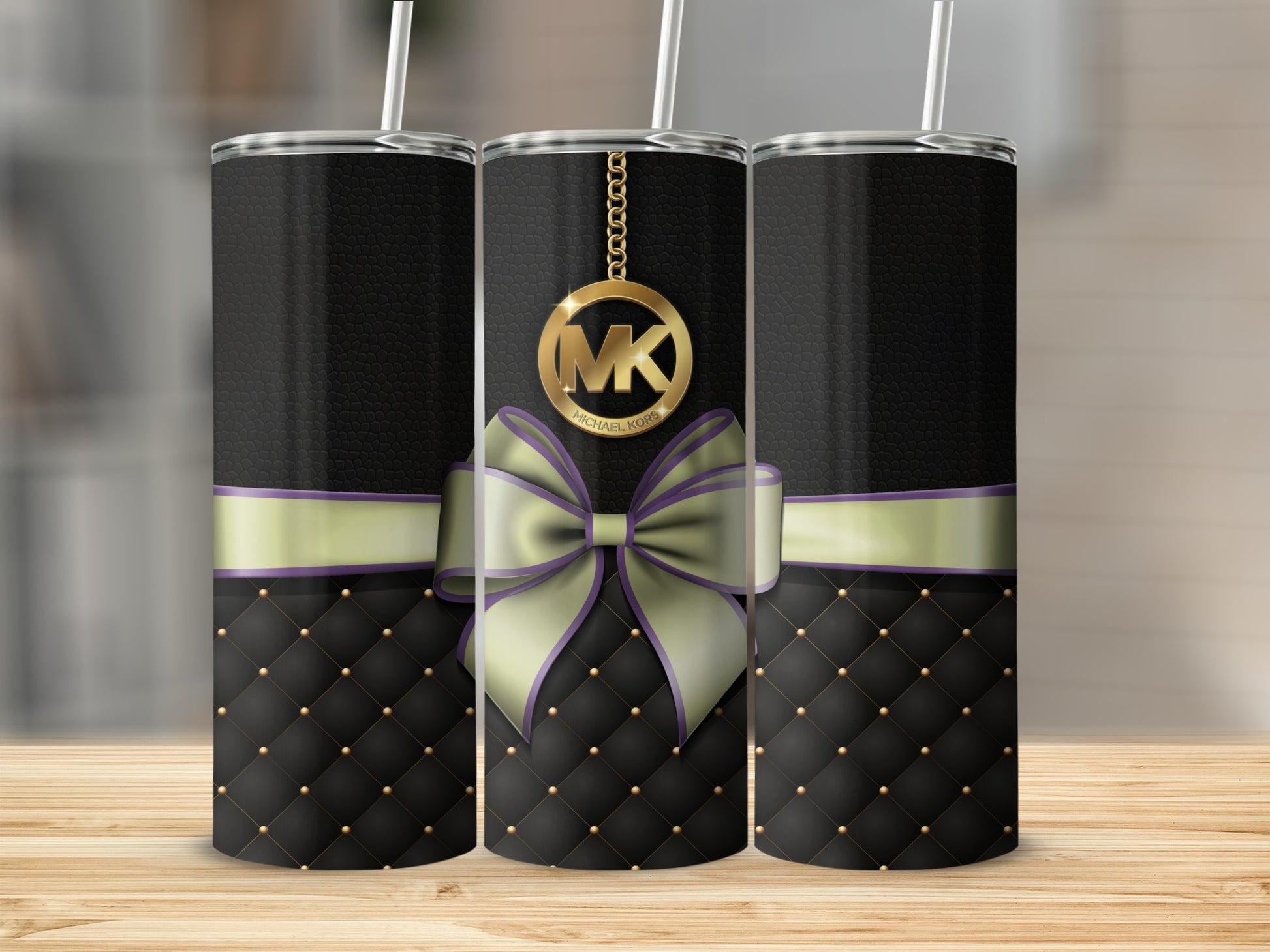 Elegant Black and Gold Tumbler with Monogram Design