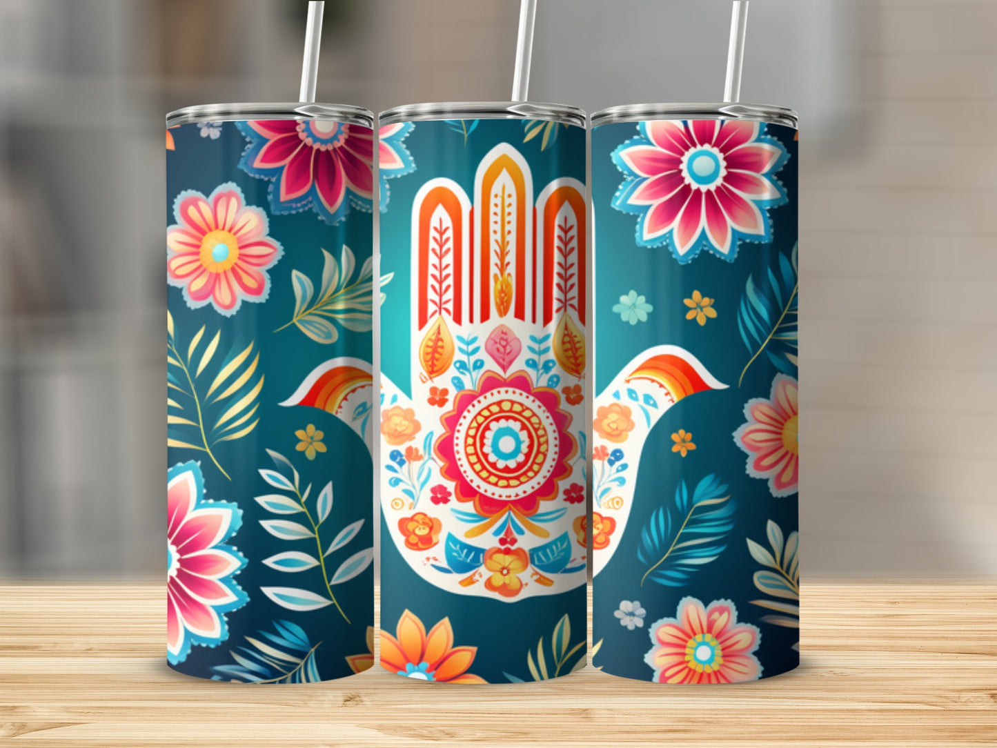 Three tumblers with colorful floral and Hamsa hand designs.