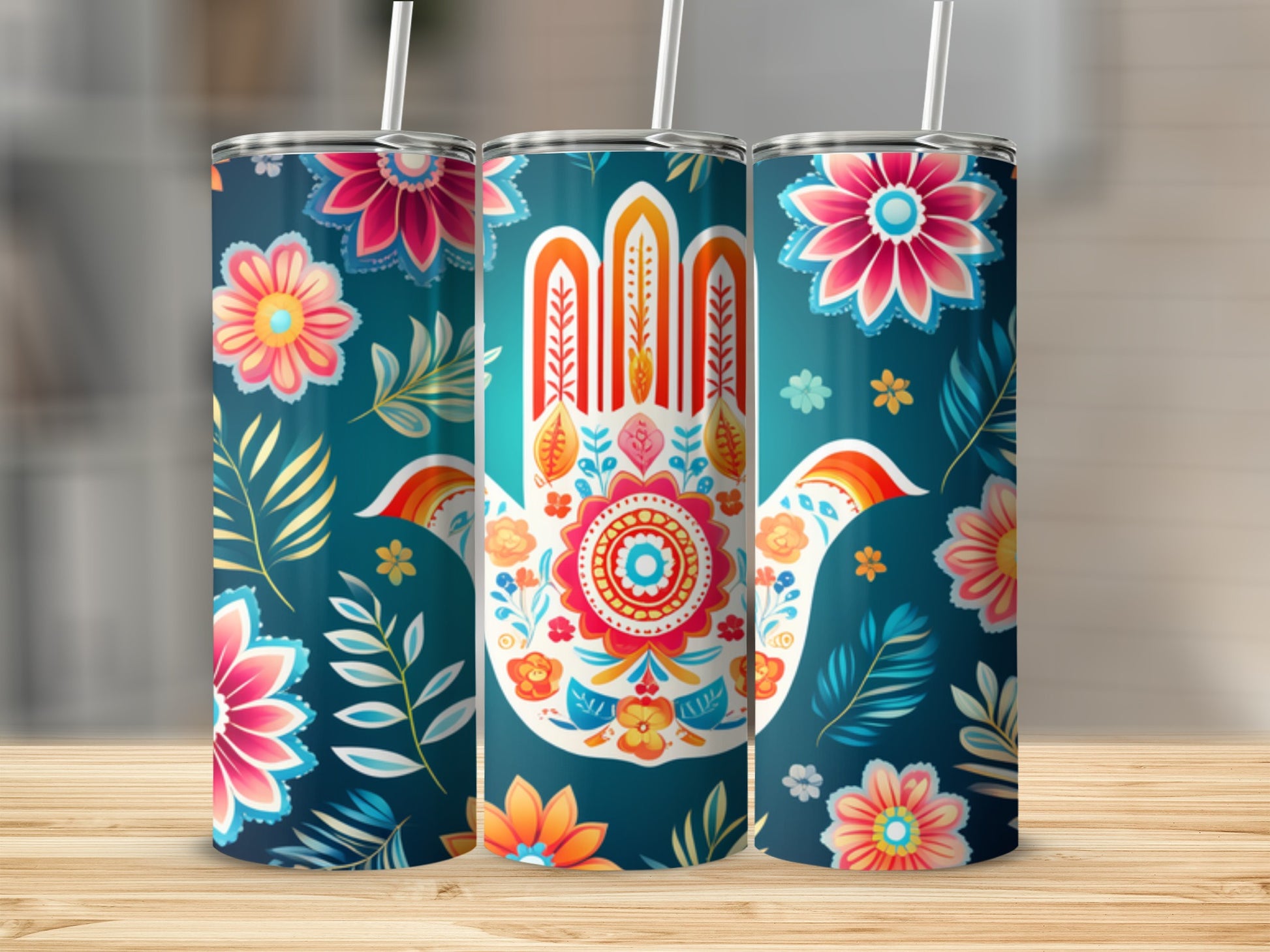 Three tumblers with colorful floral and Hamsa hand designs.