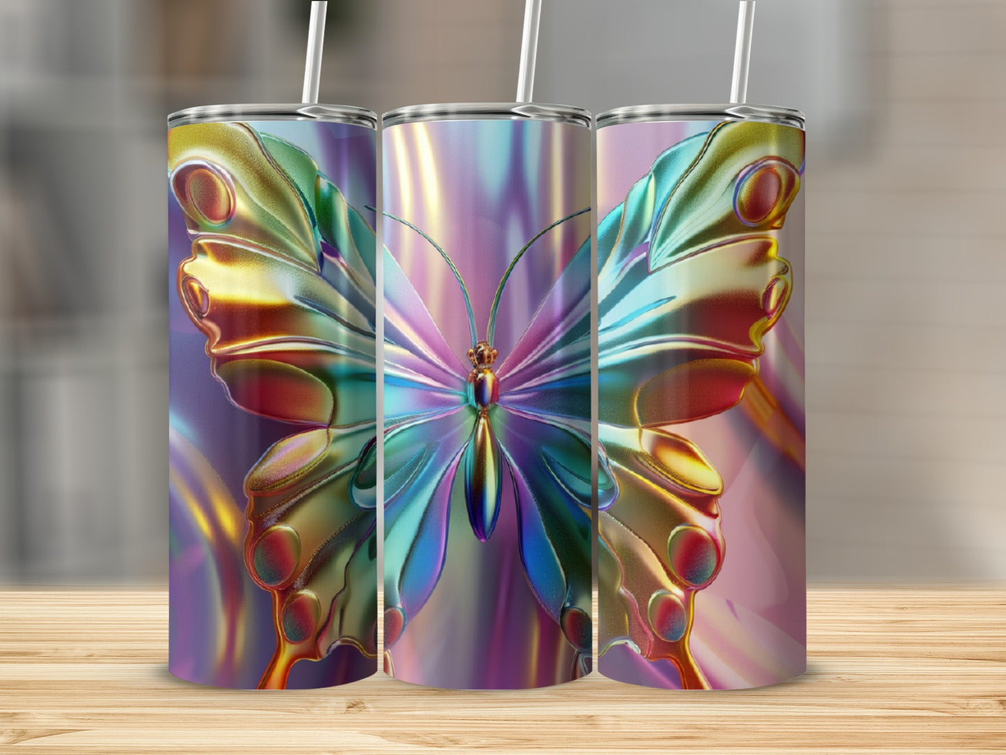 Three iridescent tumblers with butterfly designs sit on a wooden surface.