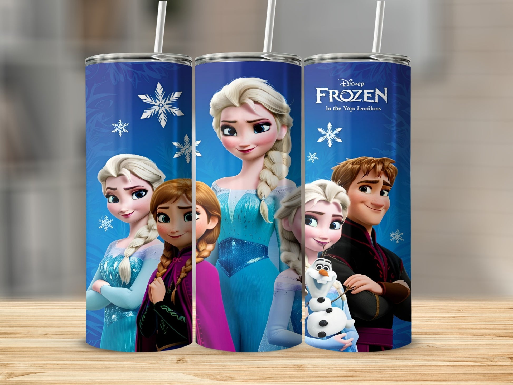 Disney Frozen characters Elsa, Anna, Olaf, and Kristoff on a blue tumbler.