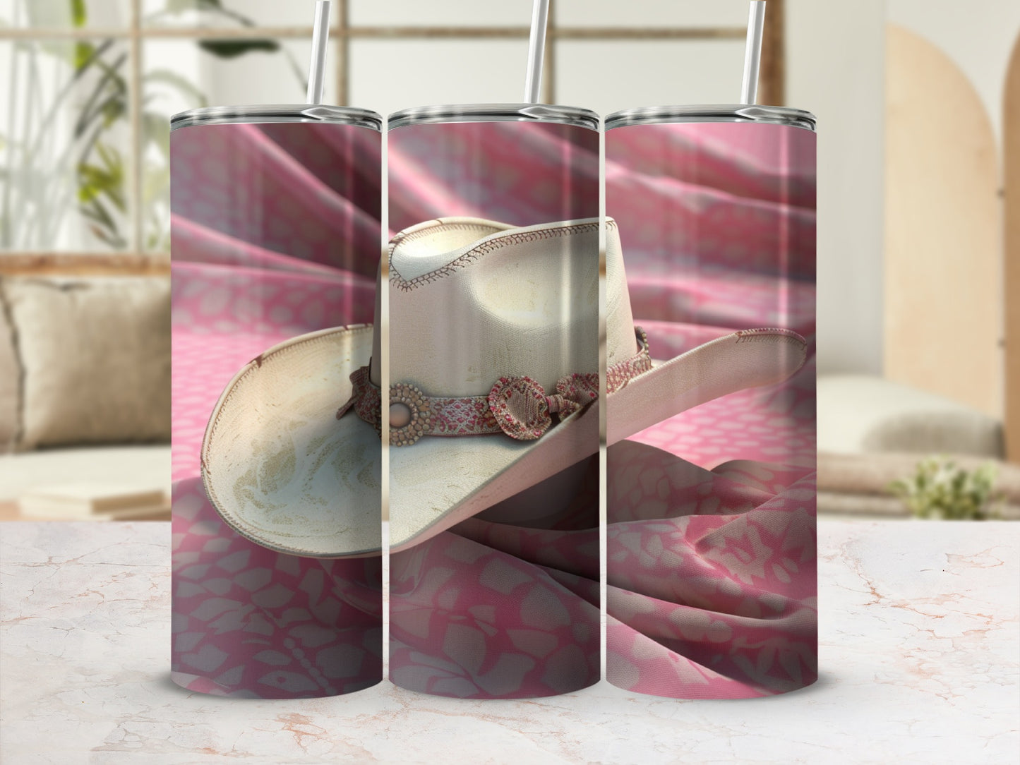 White cowboy hat with pink patterned fabric and a marble surface.