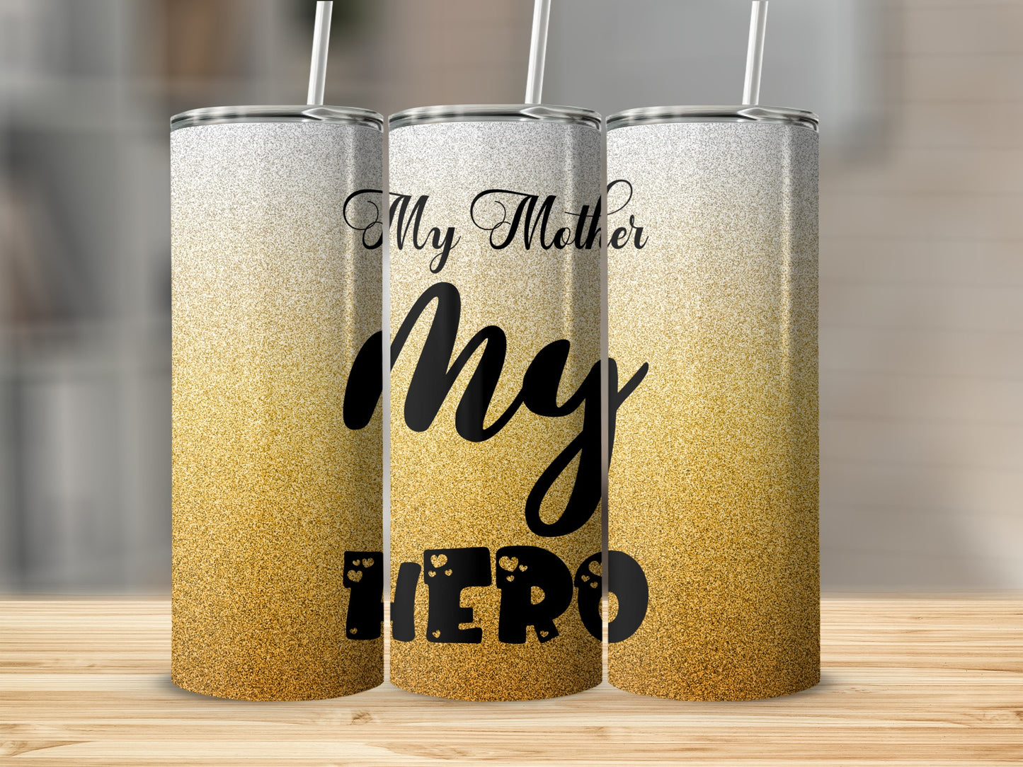 Three tumblers with "My Mother, My Hero" text on gold glitter background.