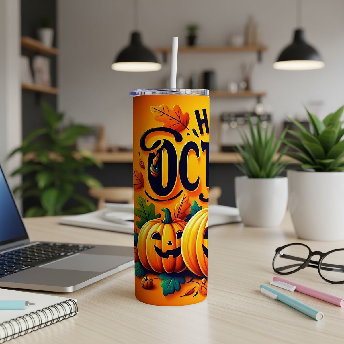 Orange tumbler with pumpkins and "Happy October" text, featuring fall leaves.