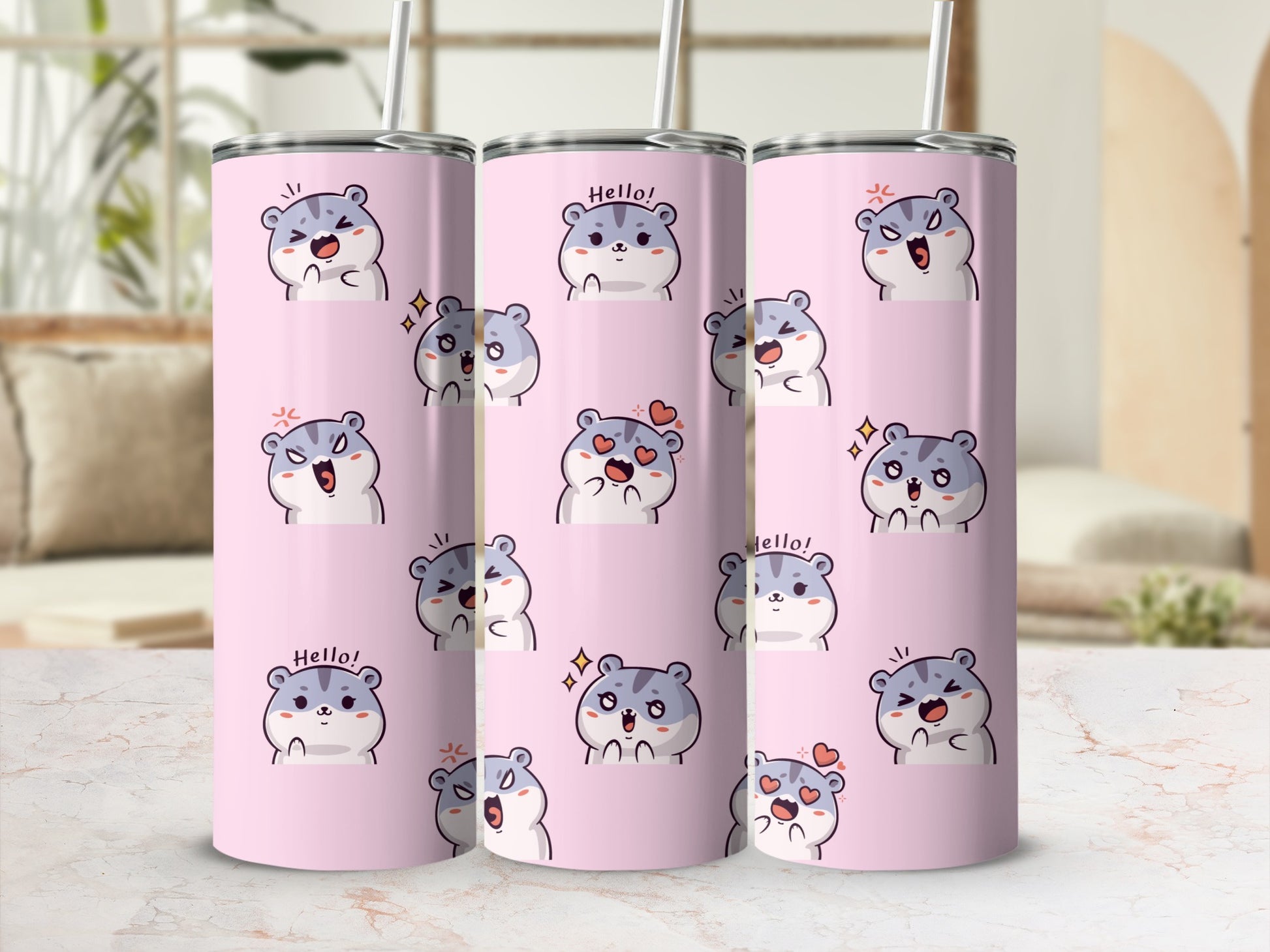 Three pink tumblers with cartoon hamster designs in various expressions.