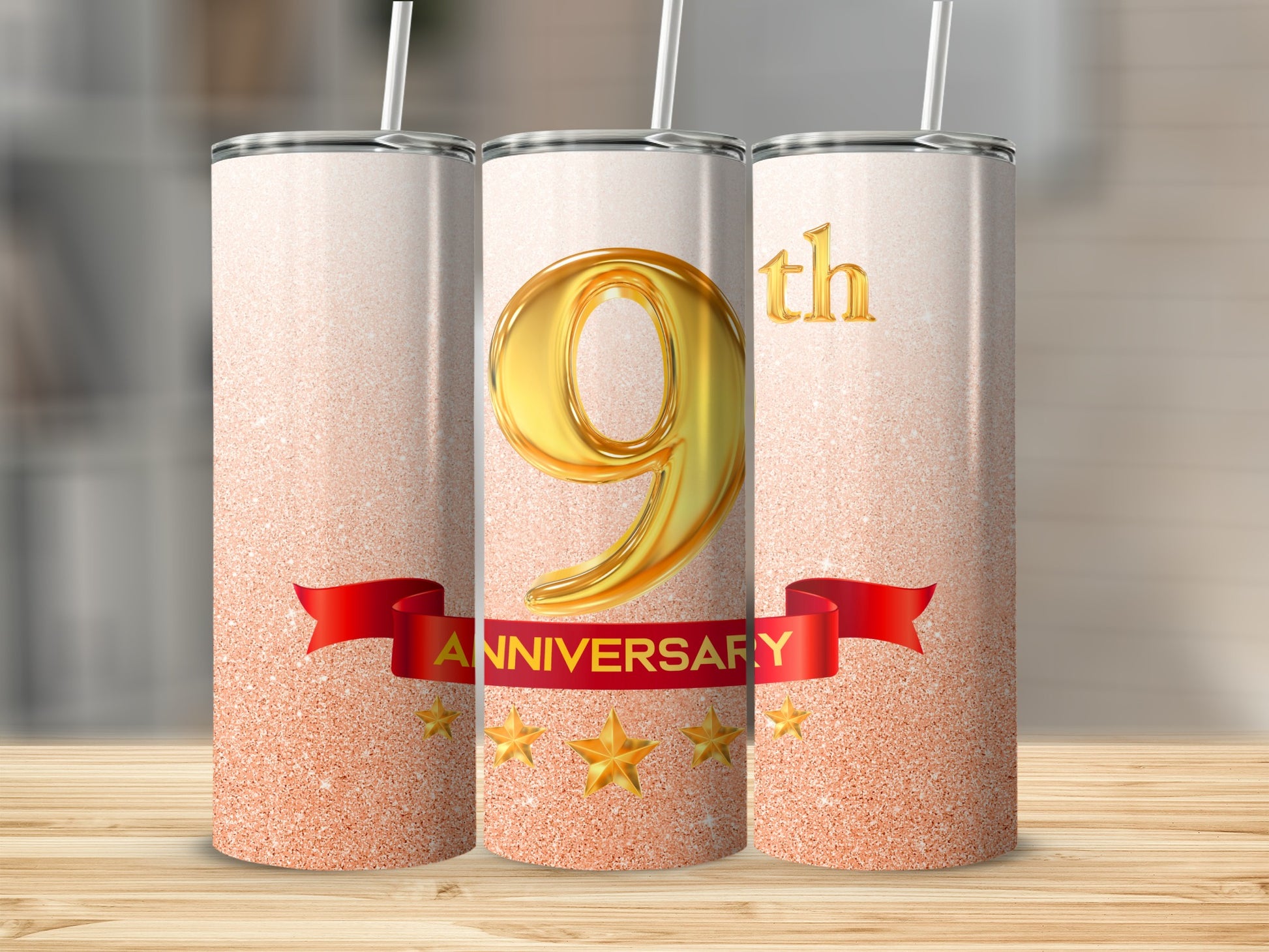 Three glitter tumblers celebrating a 9th anniversary with a red ribbon.