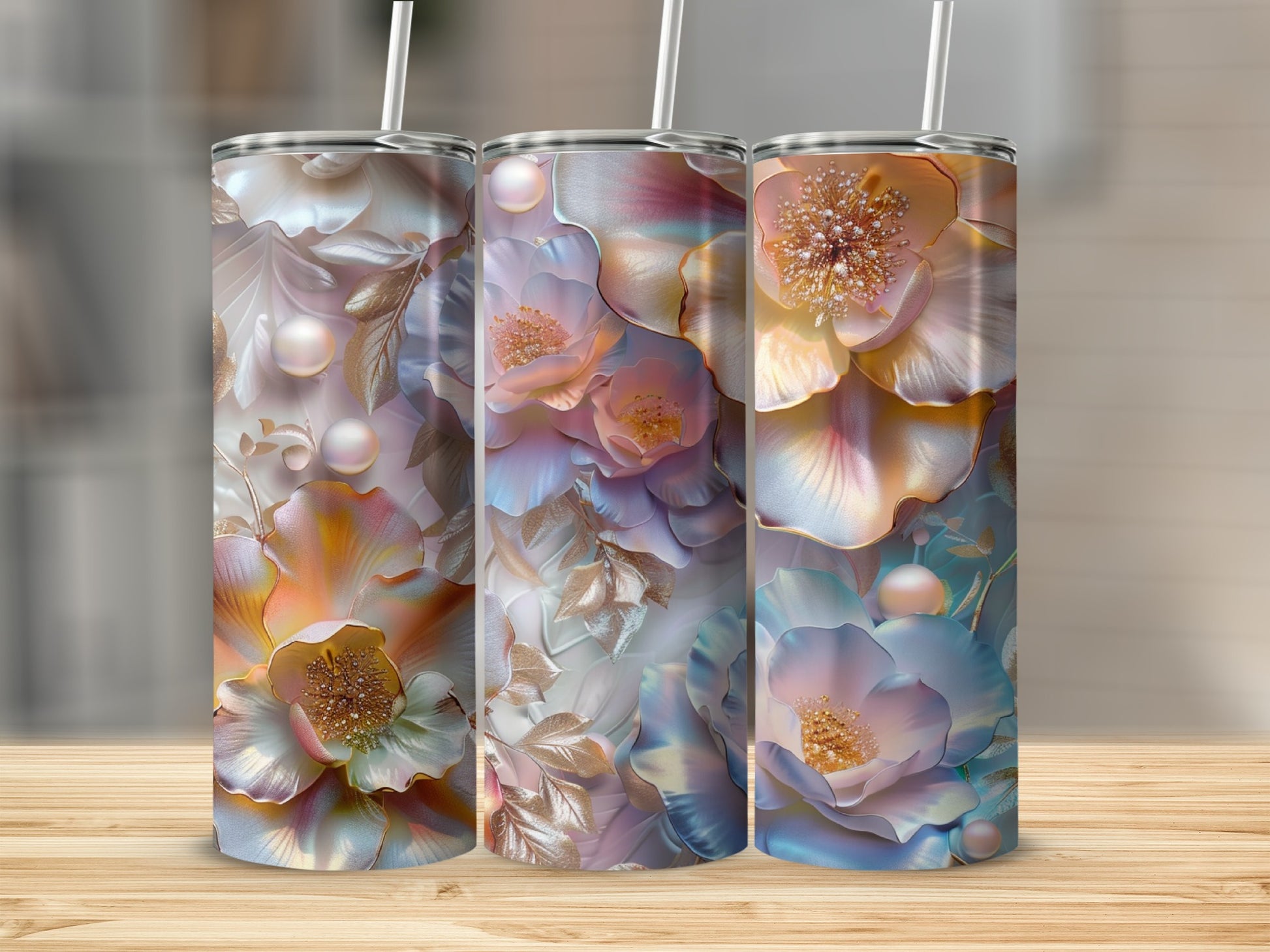 Three tumblers with iridescent floral designs featuring roses and pearl accents.