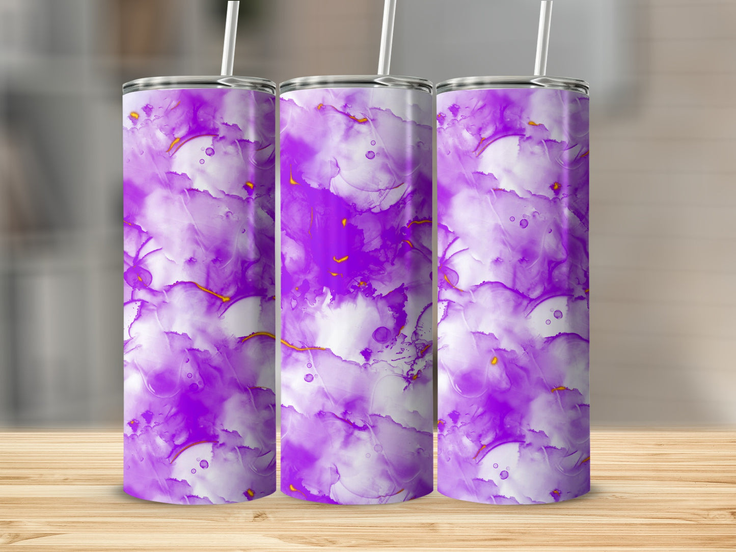 Three tumblers with purple and white abstract marble design and gold accents.
