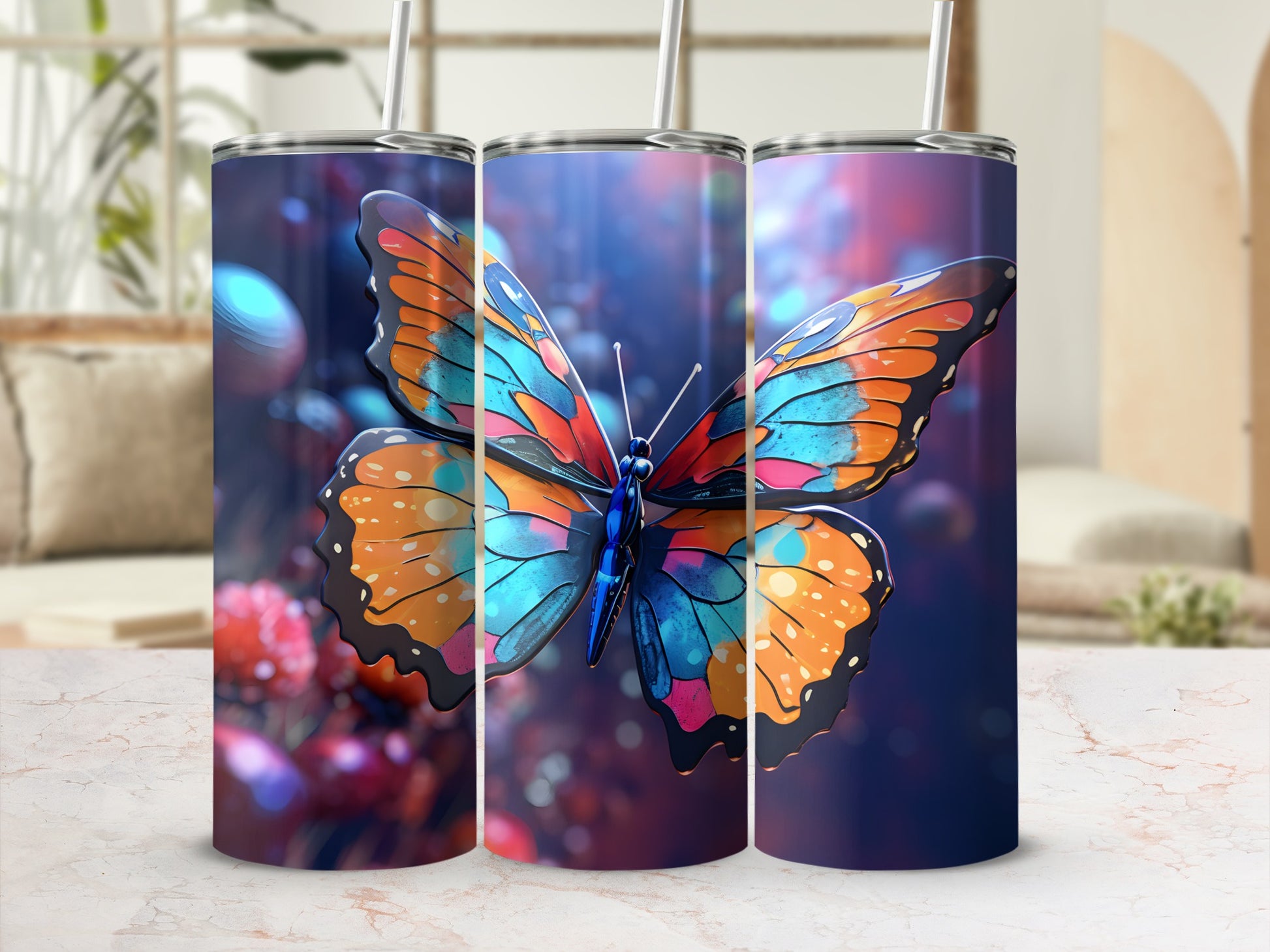 Three tumblers featuring a vibrant, colorful butterfly design.