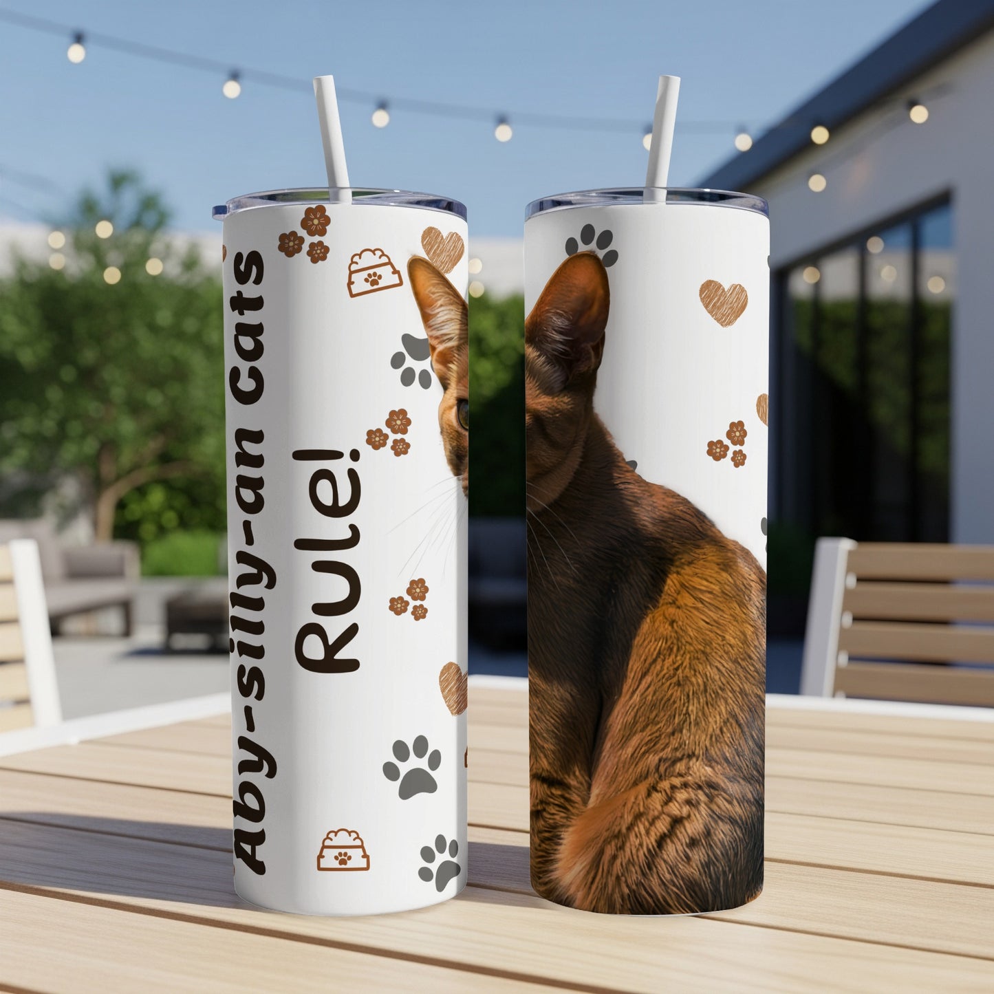 Abyssinian cat illustration and paw prints on a double-walled tumbler.