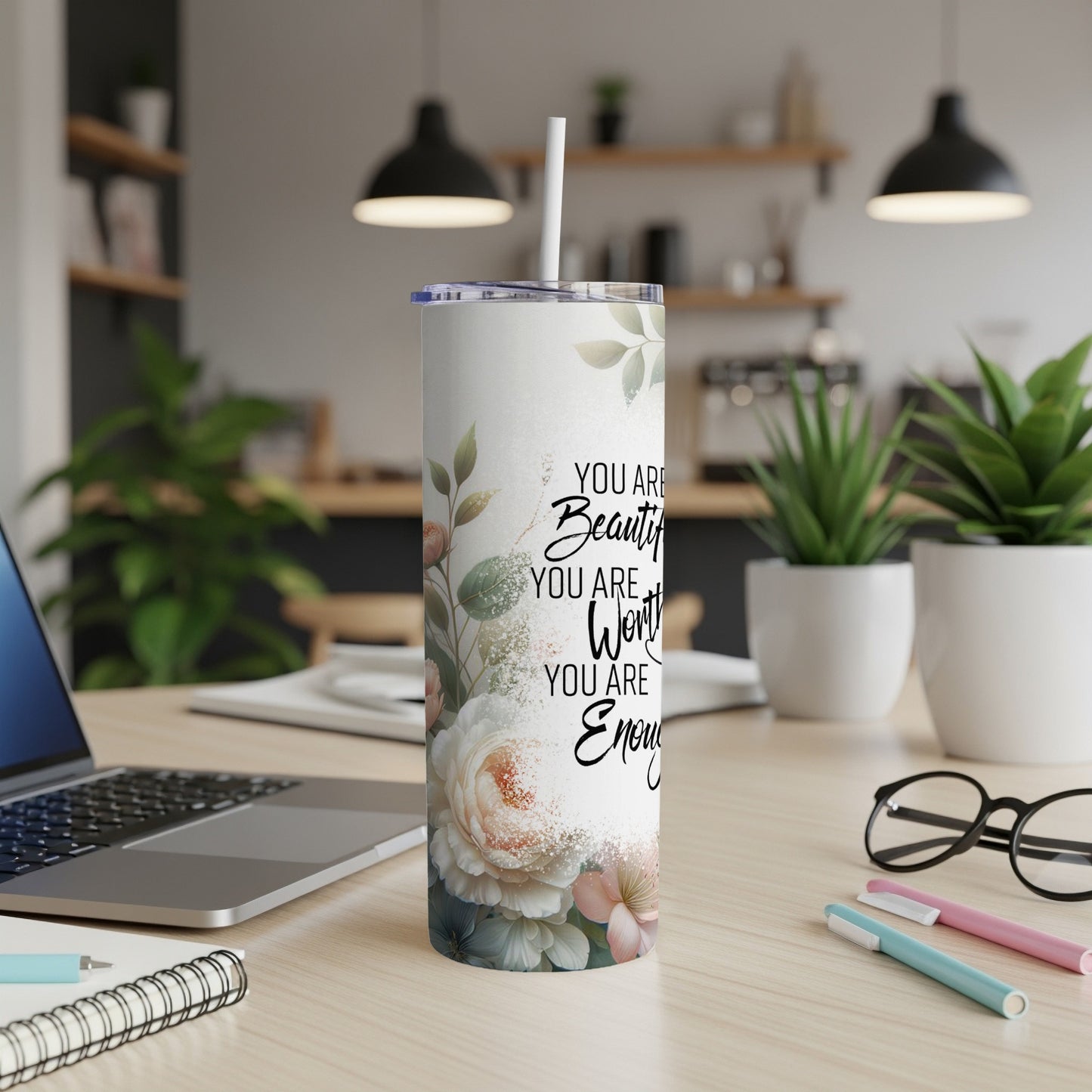 White tumbler with floral design and text "You are beautiful, you are worthy, you are enough".