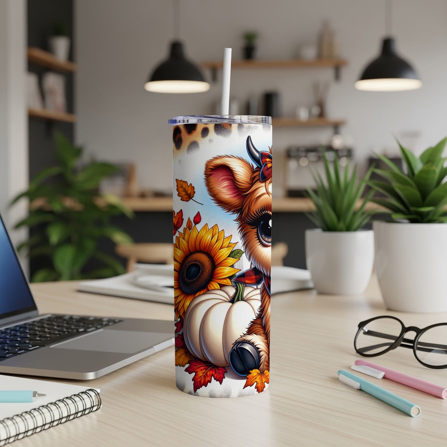 Cow with pumpkin and sunflowers on a skinny tumbler.