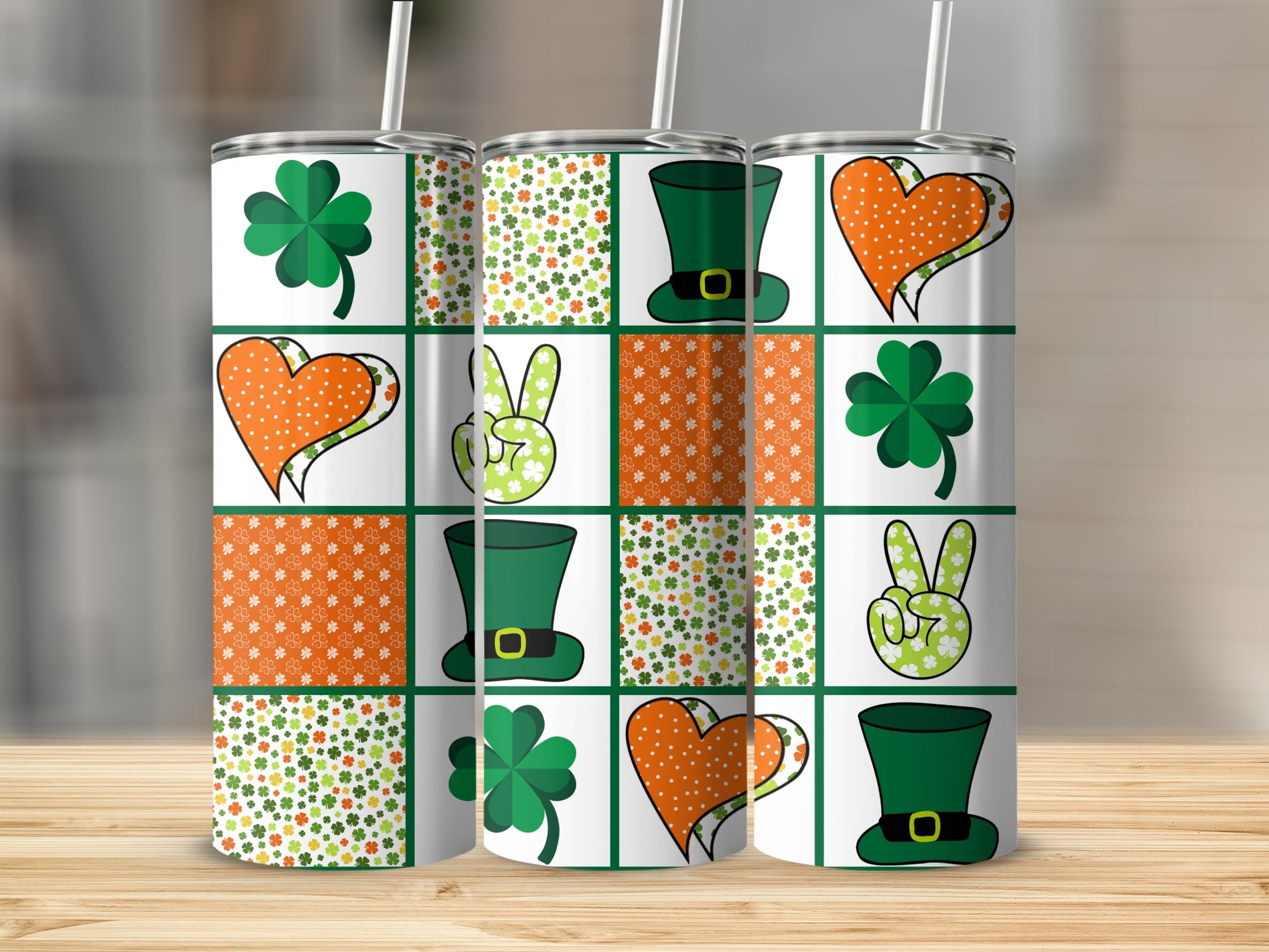 St. Patrick's Day themed tumblers with shamrocks, hearts, and peace signs.