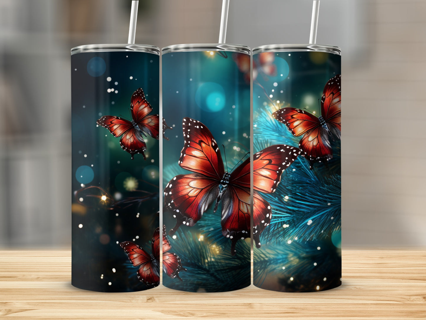 Three tumblers with a butterfly and bokeh design.