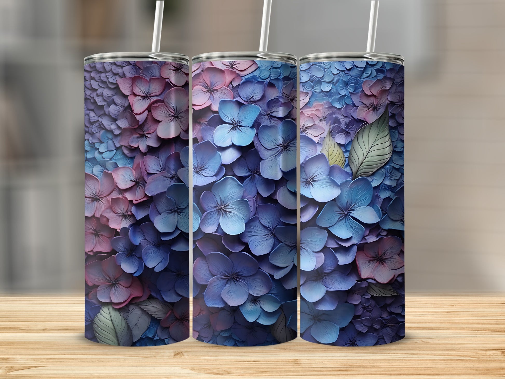 Three tumblers with a close-up blue and purple hydrangea flower pattern.