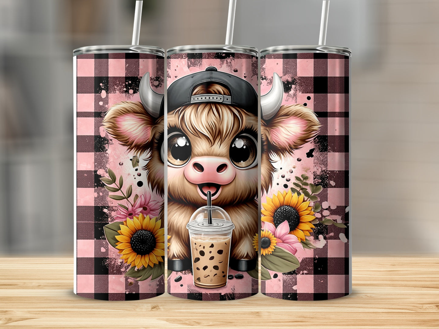 Pink buffalo plaid tumbler with a cute cartoon cow holding a bubble tea.