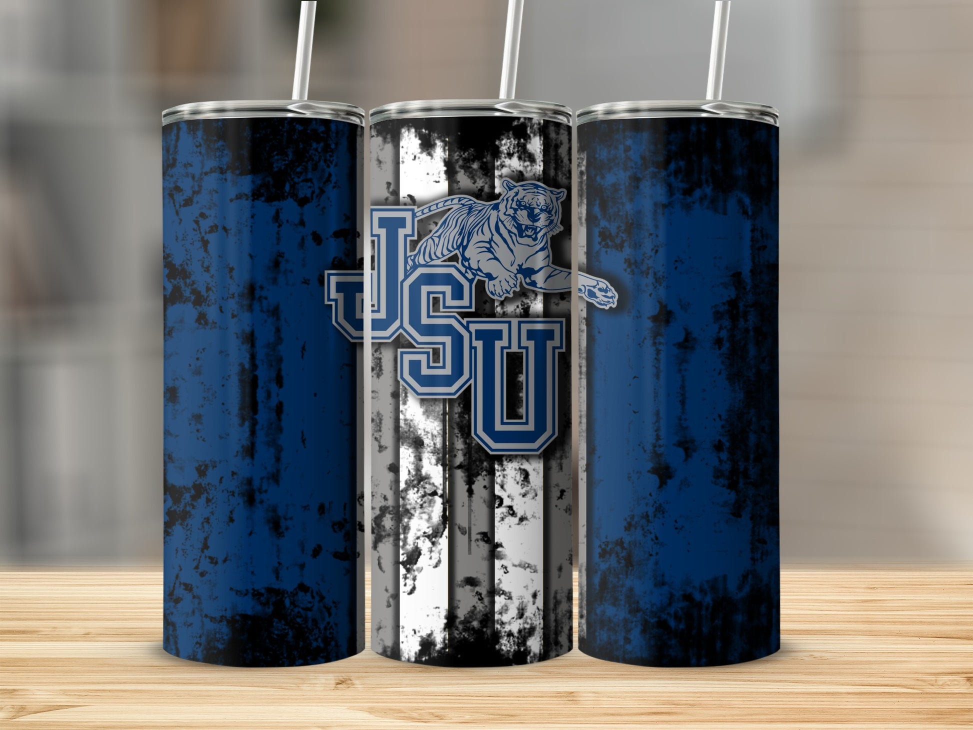 Three tumblers with blue, black, and white grunge design and JSU tiger logo.