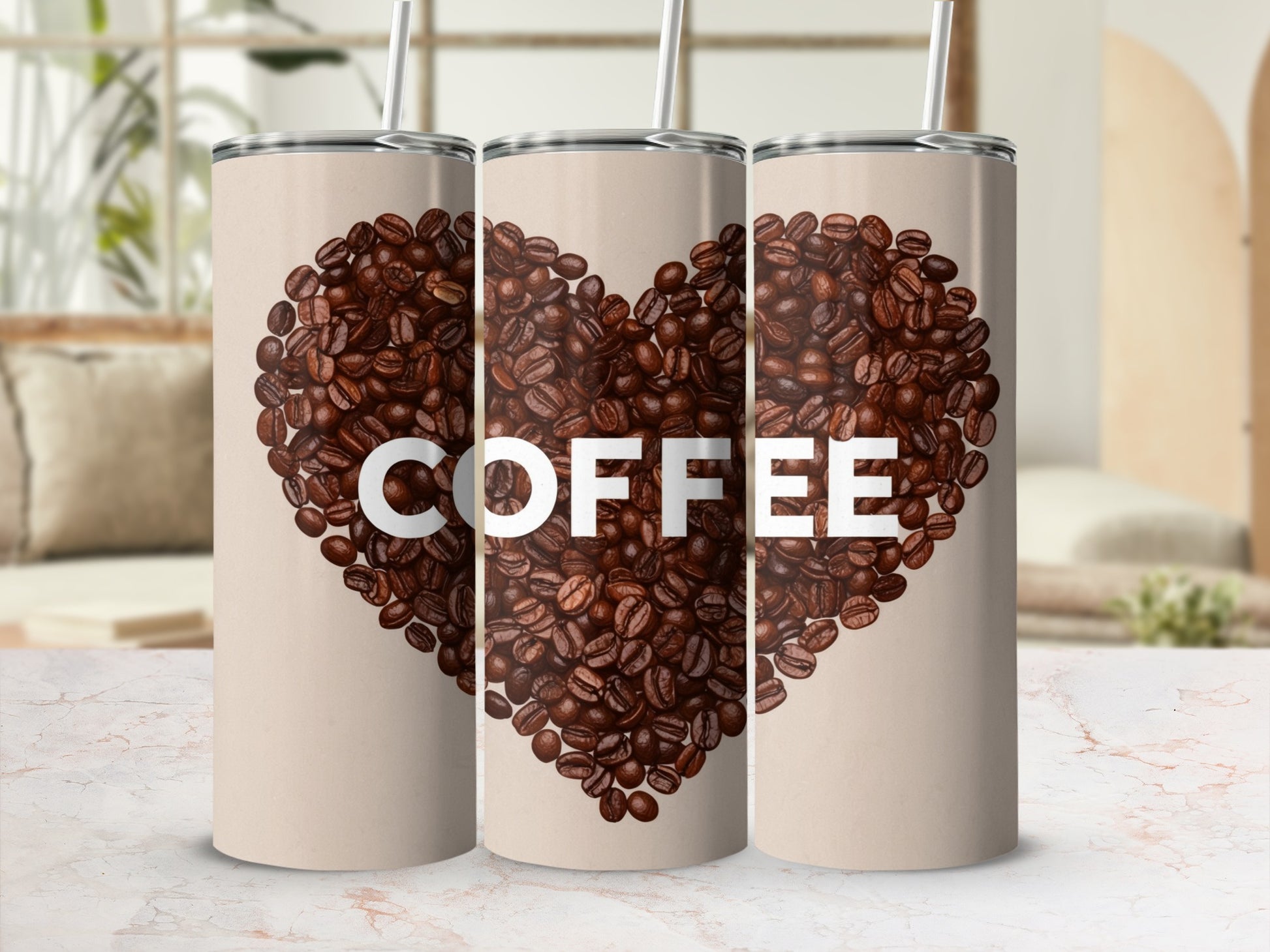 Three tall tumblers with a heart made of coffee beans and the word "COFFEE".