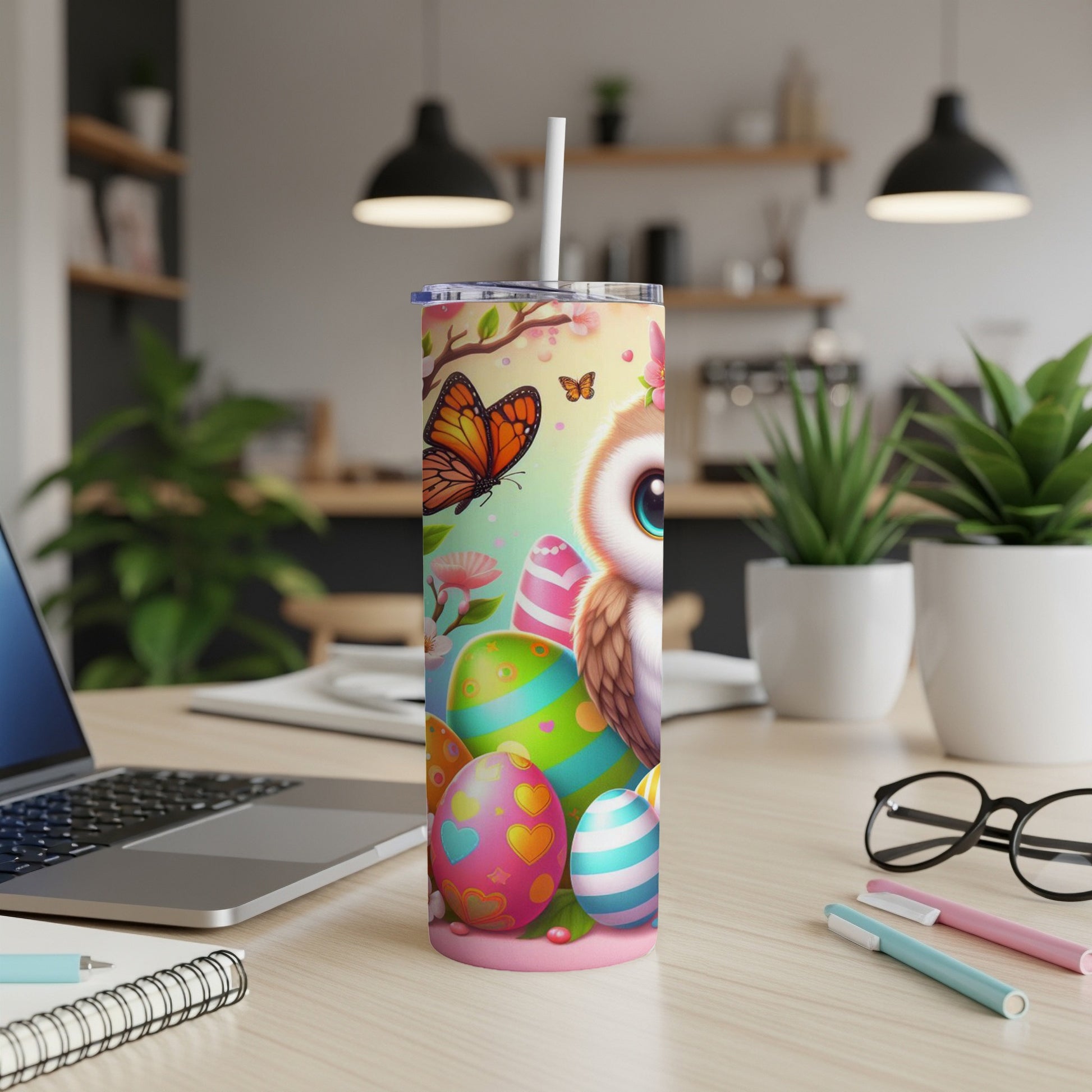 Cute owl with butterfly and Easter eggs on a patterned tumbler.