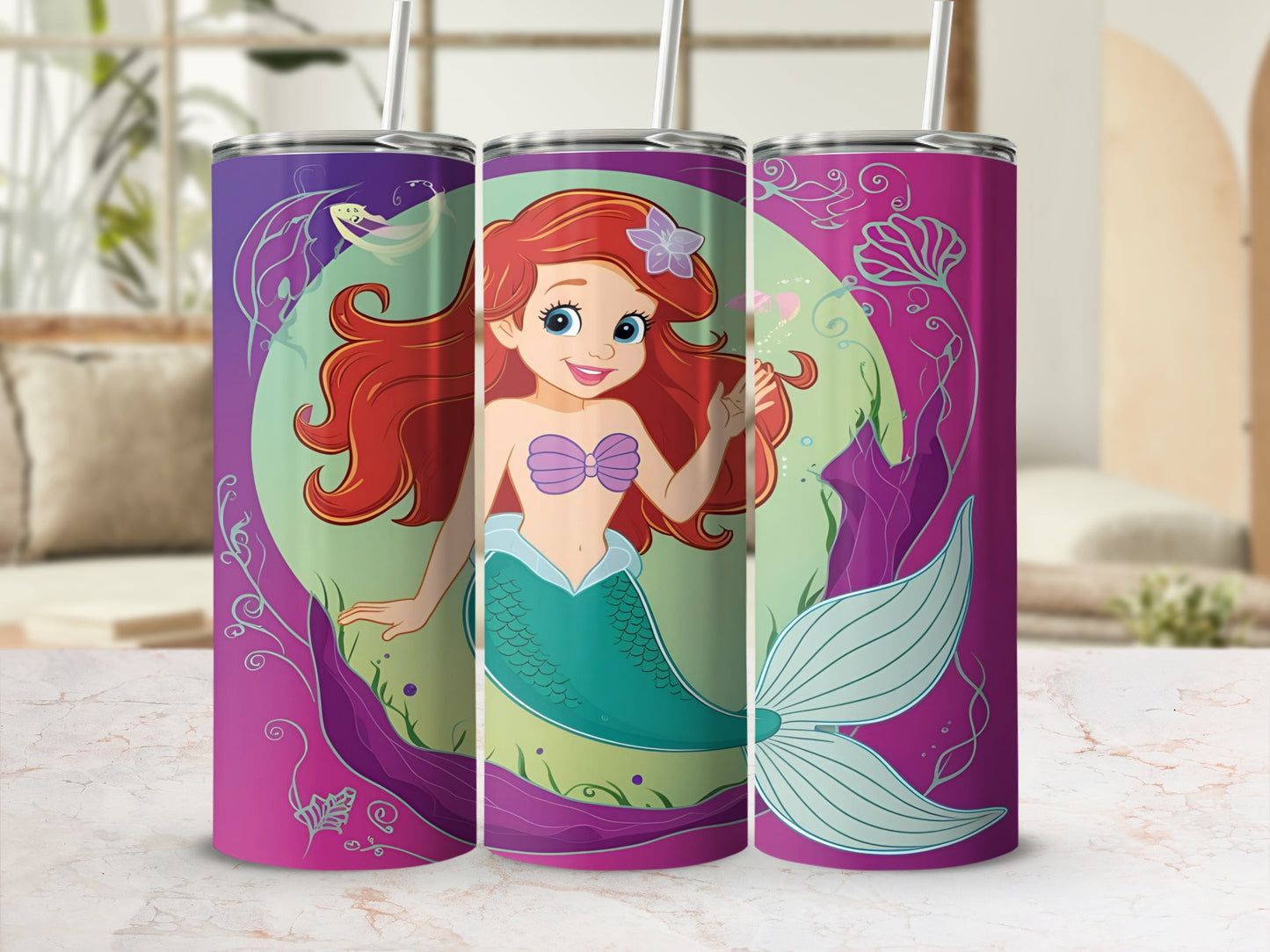 Cartoon mermaid with red hair and teal tail on purple tumbler.