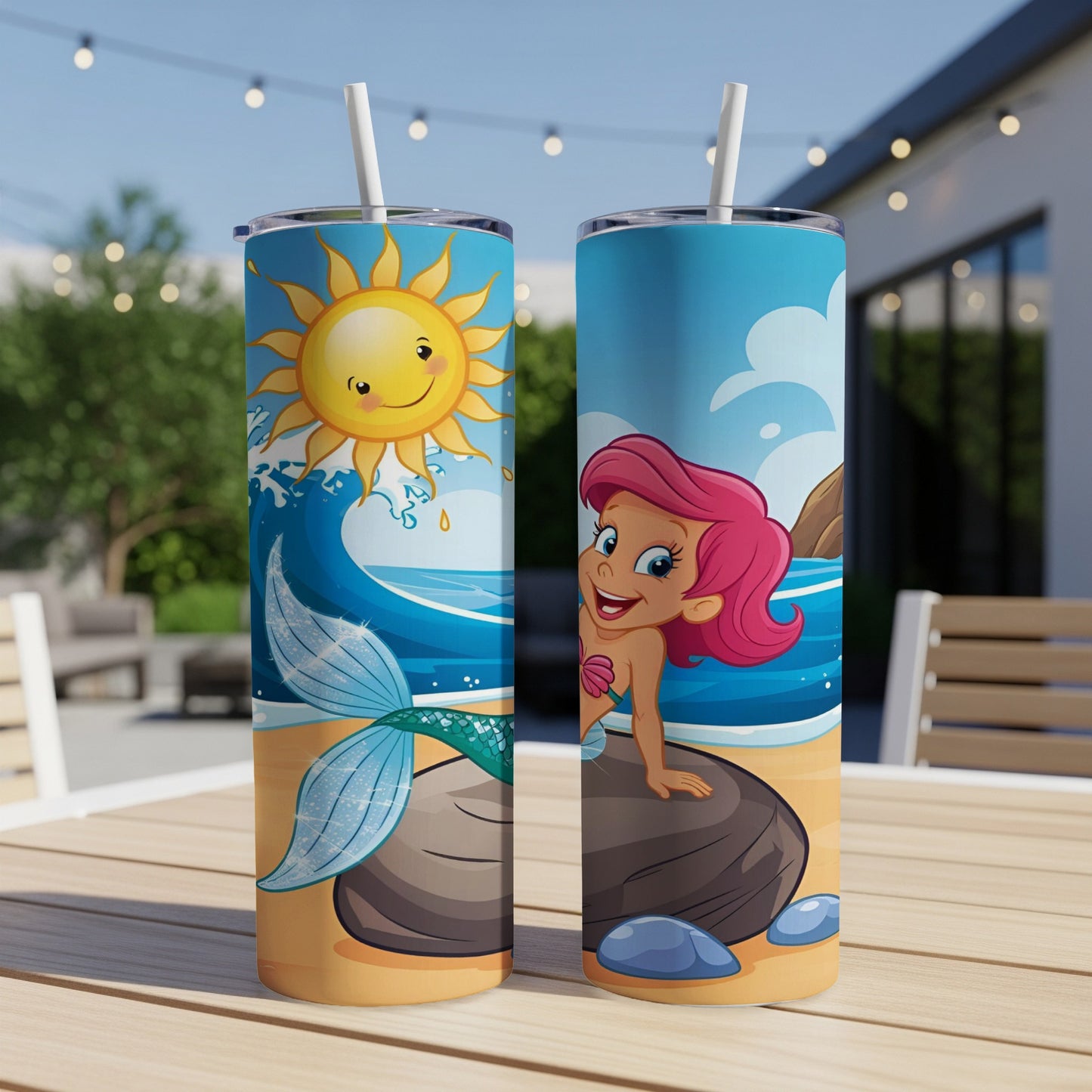Two tumblers with a mermaid on a beach and a sun wave design.