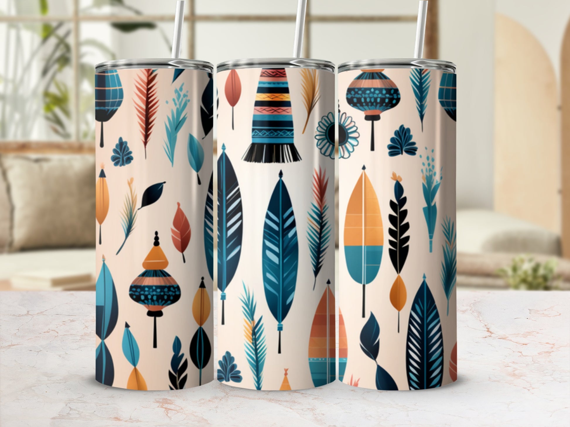 Three tumblers with a teal, orange, and beige feather and lantern pattern.