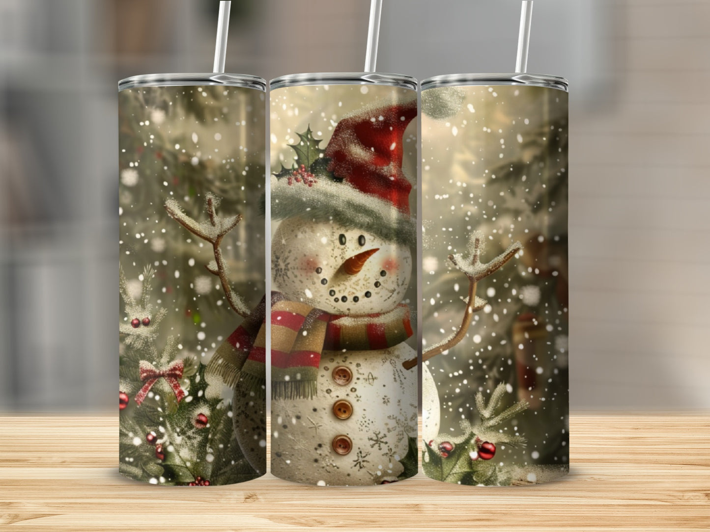 Three tumblers featuring a festive snowman design with snow and greenery.