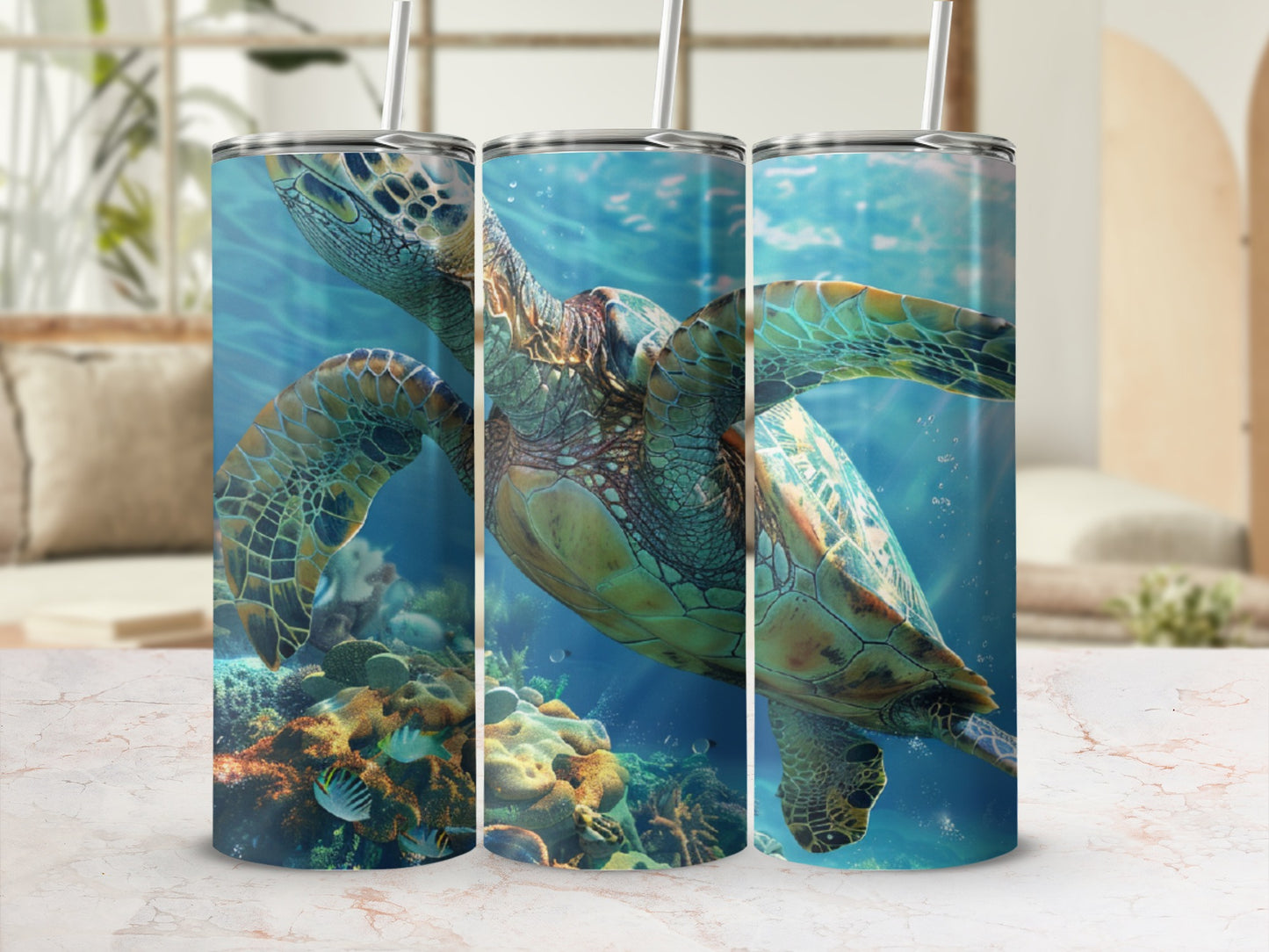 Three tumblers showcasing a sea turtle swimming over colorful coral reefs.