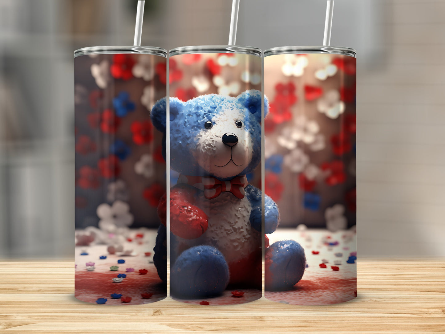 Blue bear tumbler with red, white, and blue flowers.