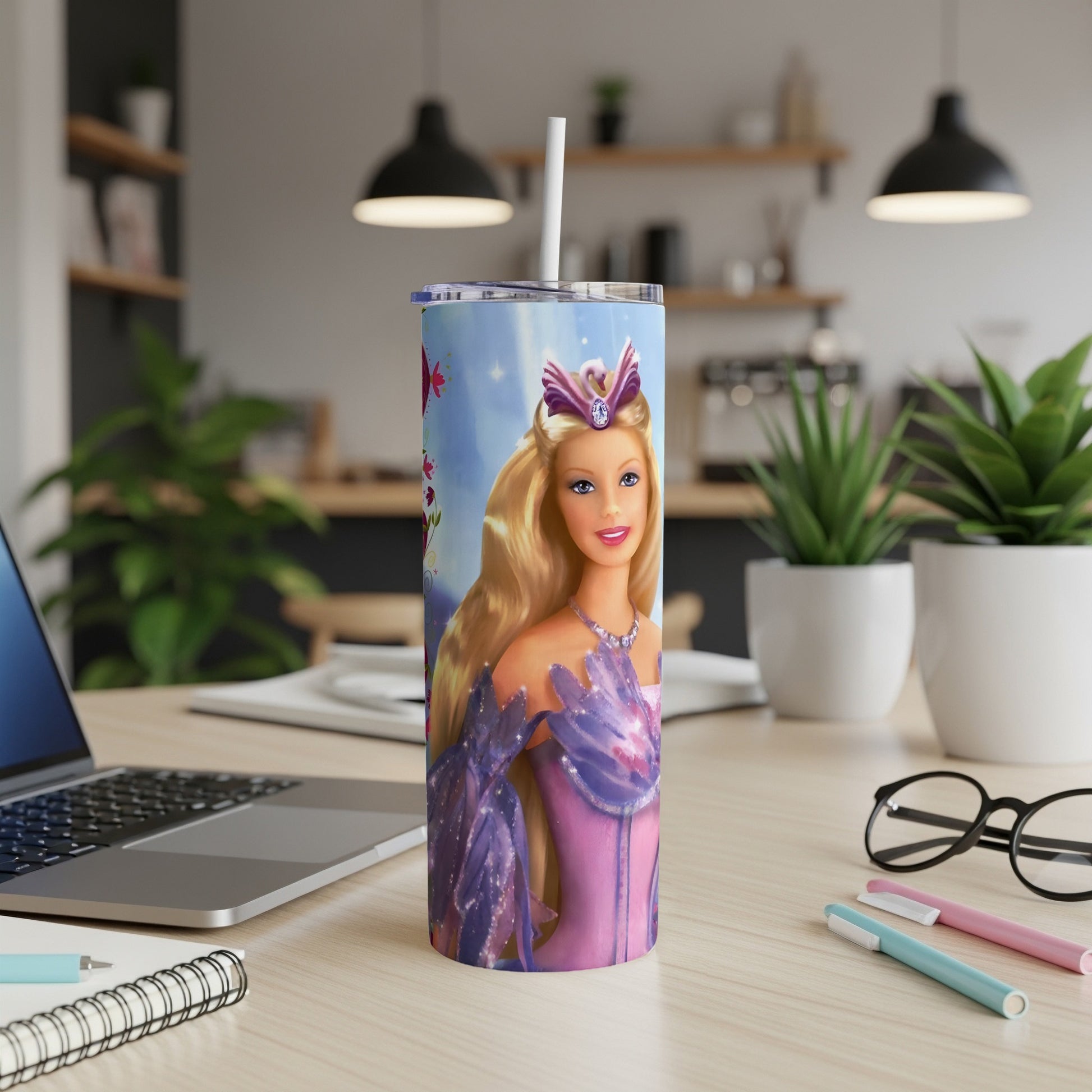 Barbie in a sparkling purple dress on a white tumbler with a straw.