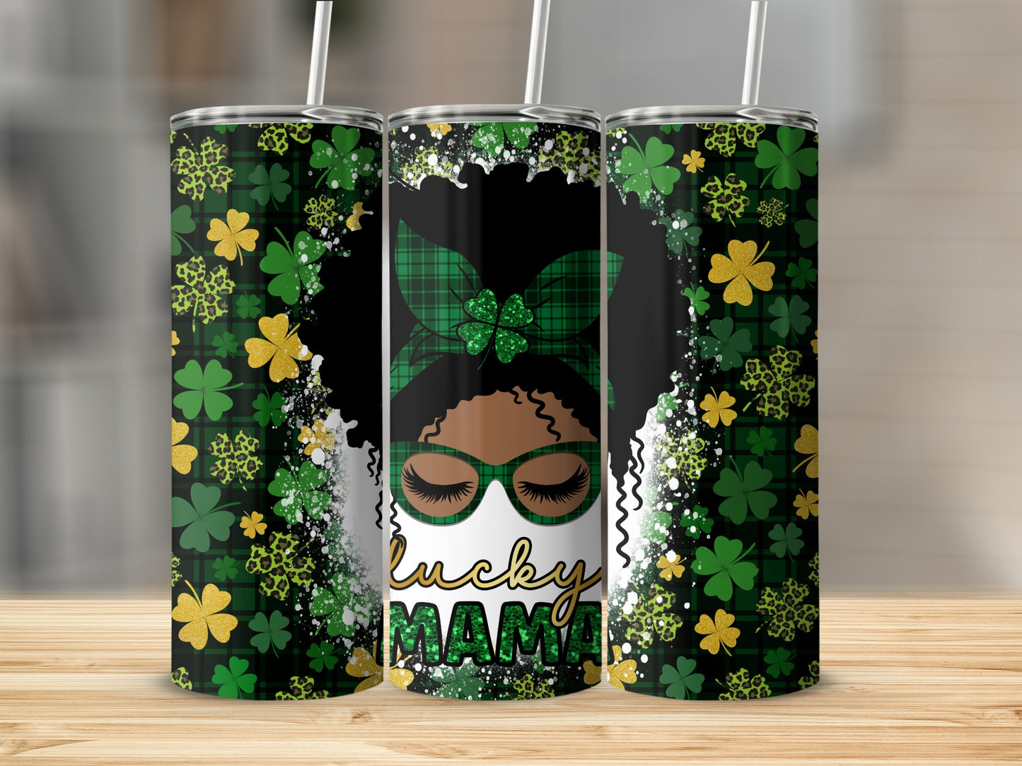 Green and gold clover pattern tumbler with "Lucky Mama" text.