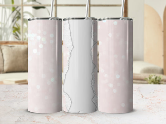 Pink speckled tumbler with torn paper texture and straw.