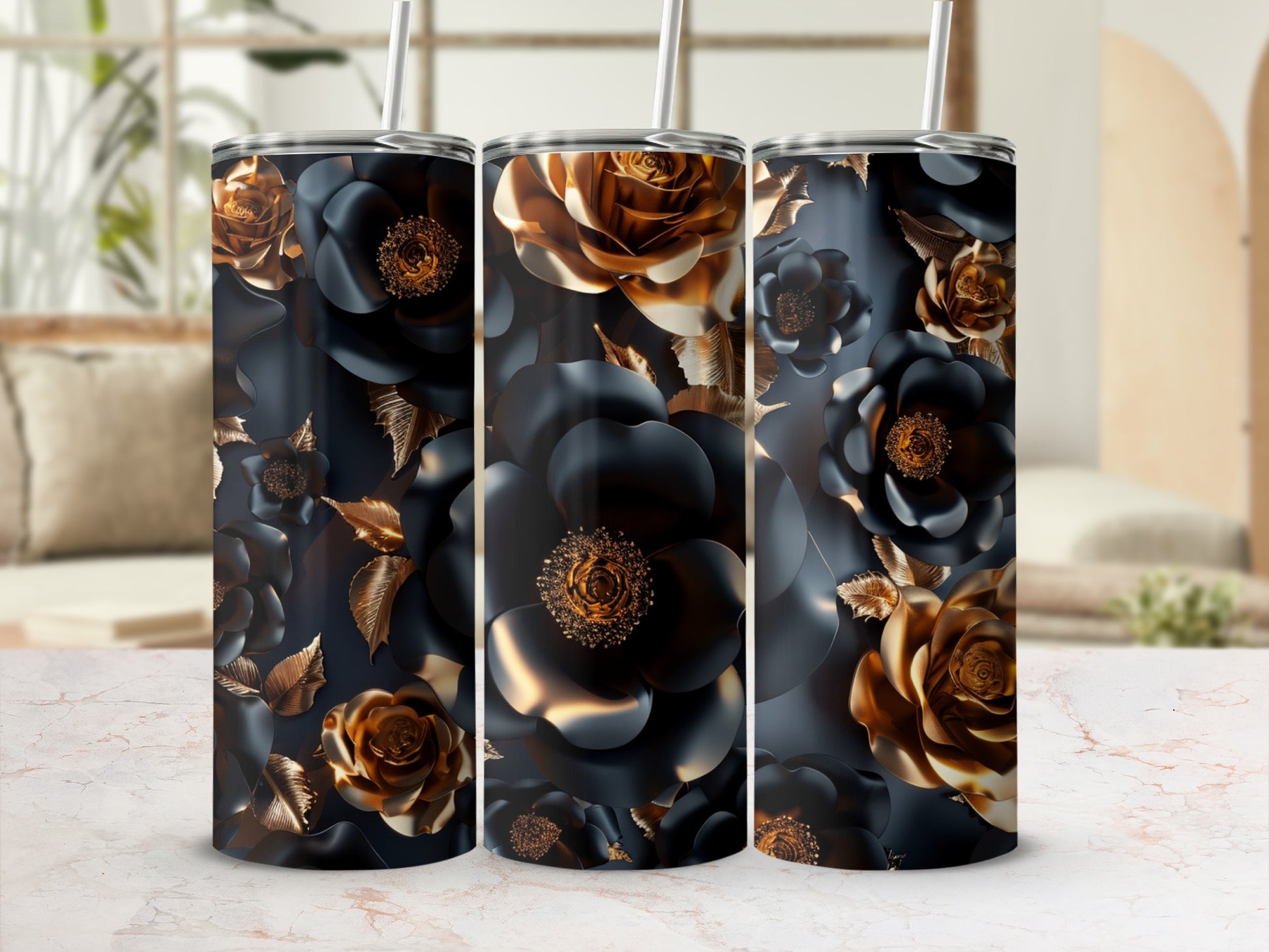 Three dark floral tumblers with gold accents on a marbled surface.