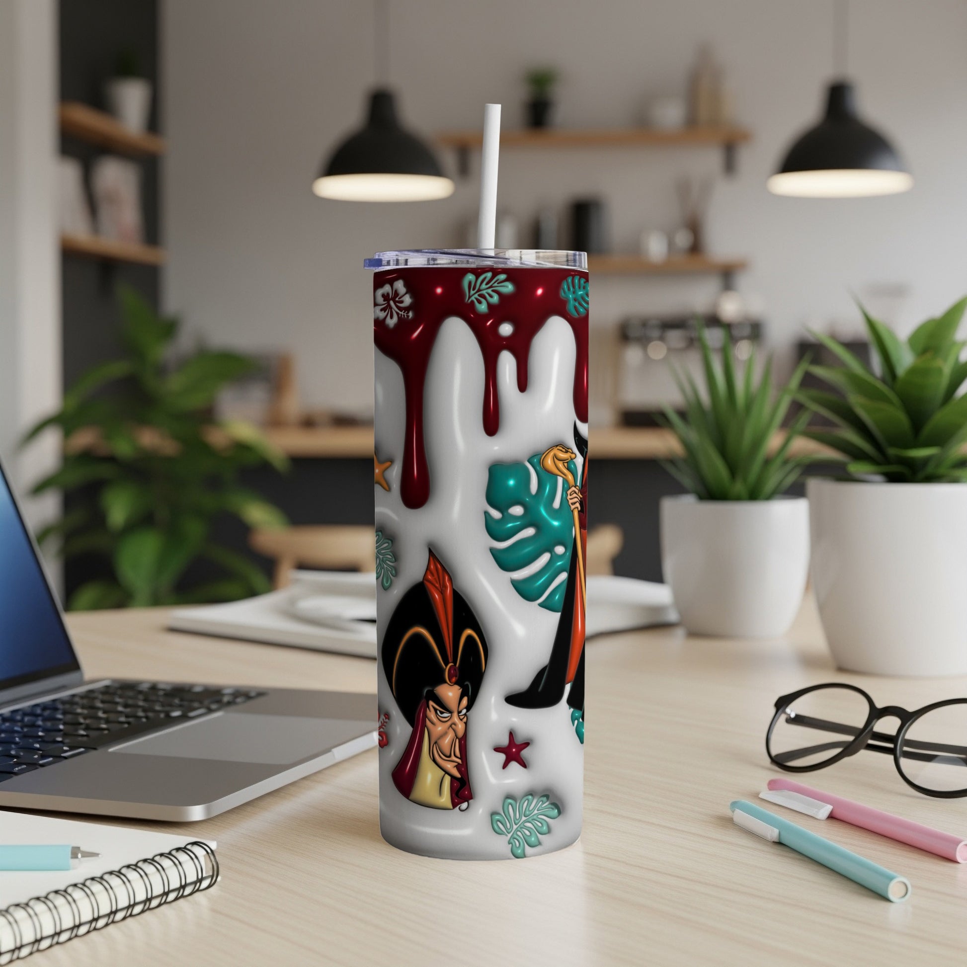 Jafar and tropical leaves decorate a white tumbler with red drips.