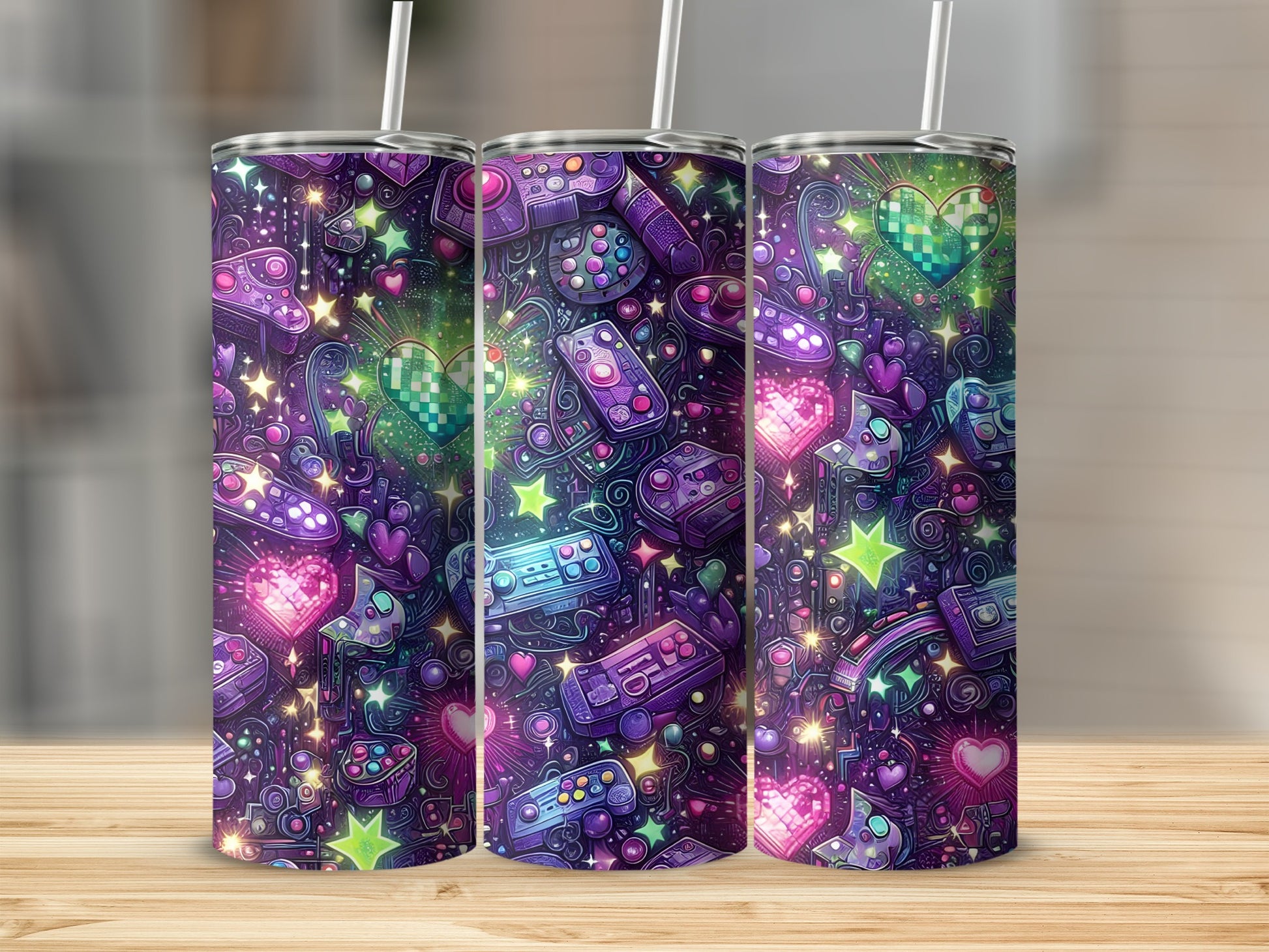 Three tumblers with a colorful, pixelated video game controller and heart pattern.