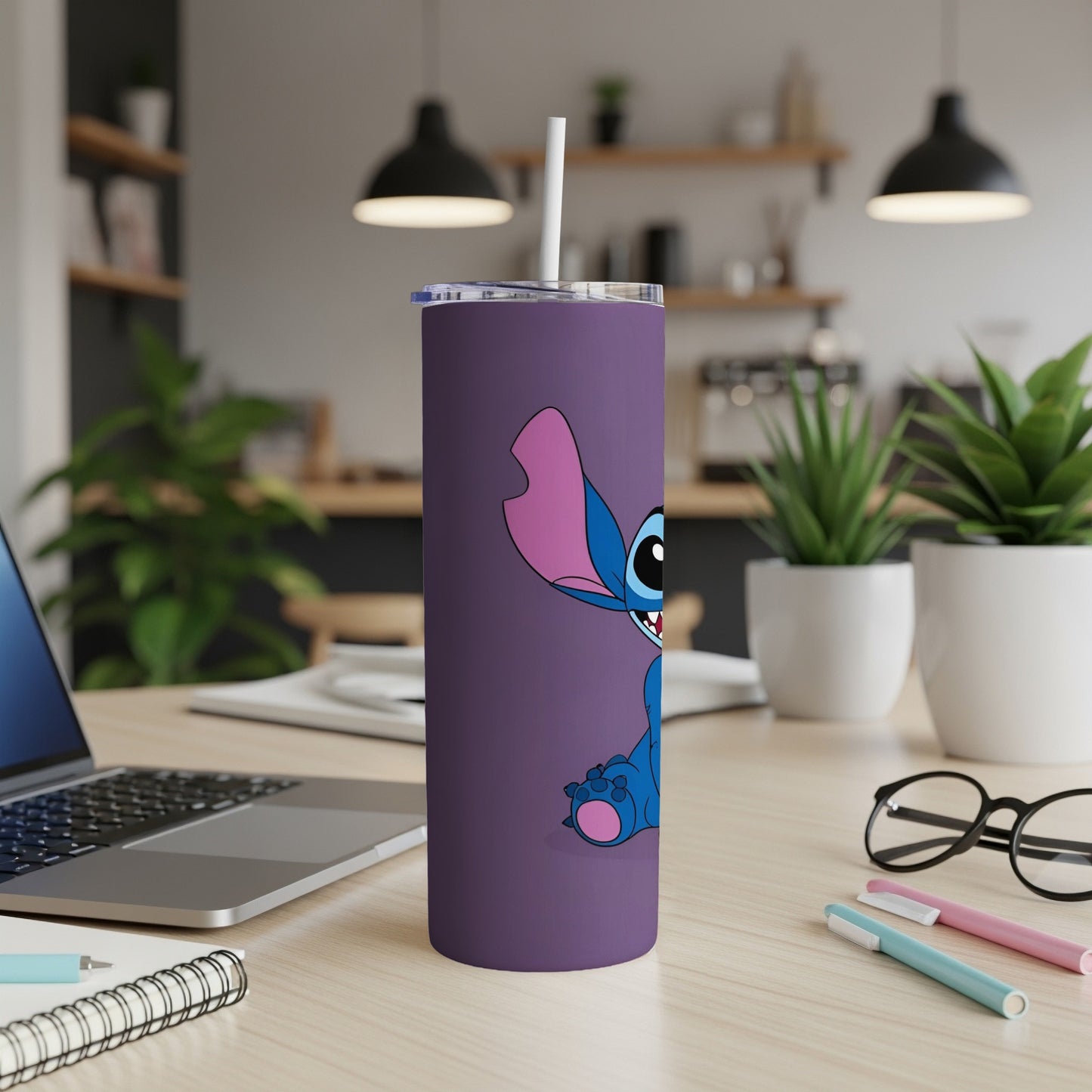 Purple tumbler featuring Disney's Stitch character with a straw.