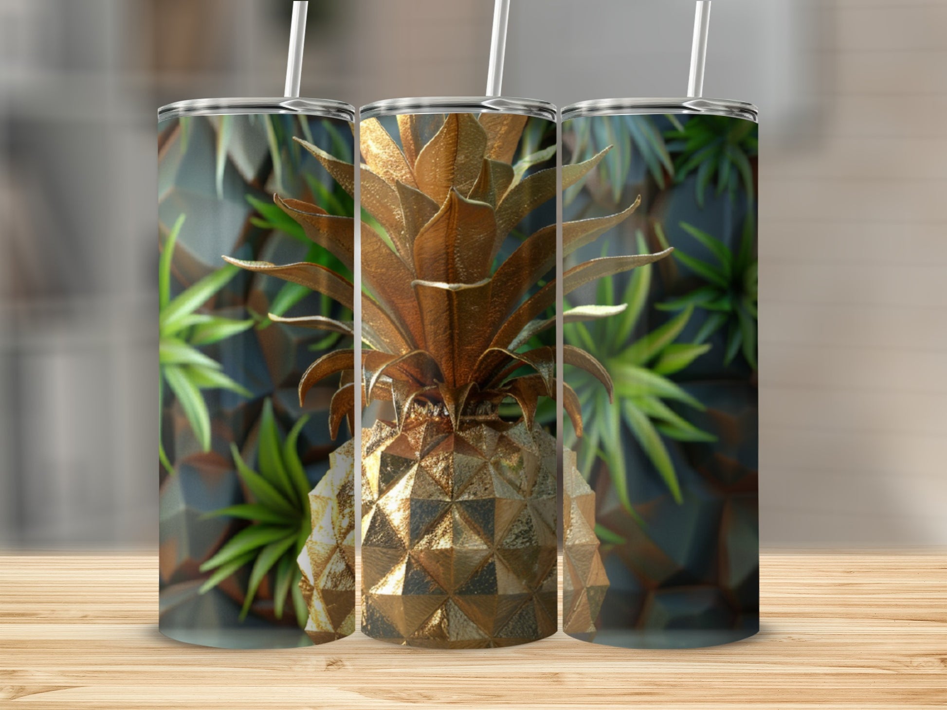 Gold pineapple tumbler with geometric background on a wooden surface.