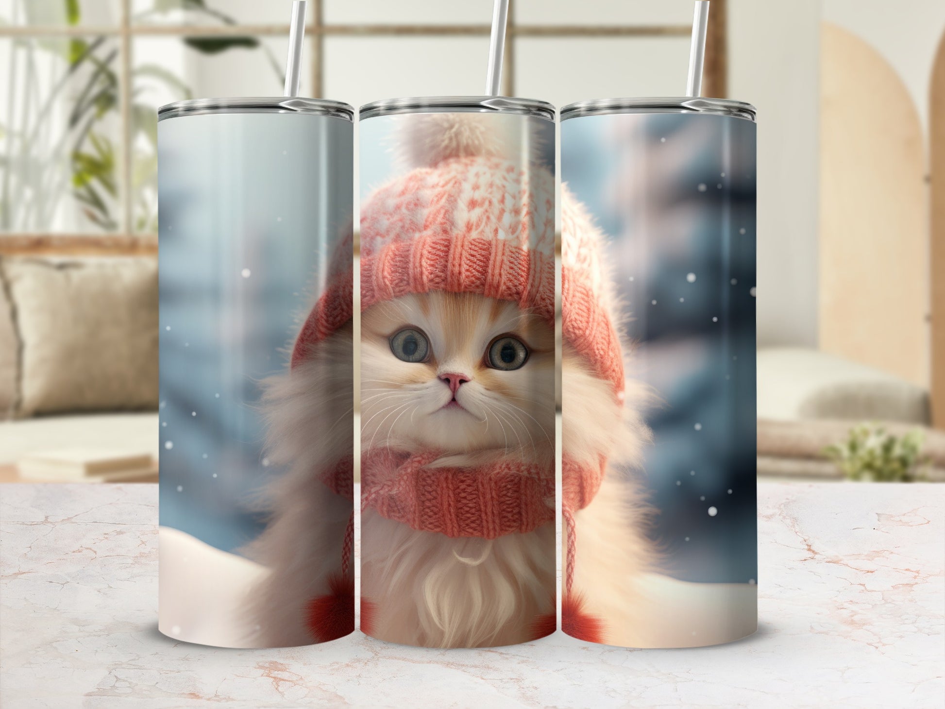 Fluffy kitten in winter hat and scarf, featured on three tumblers.